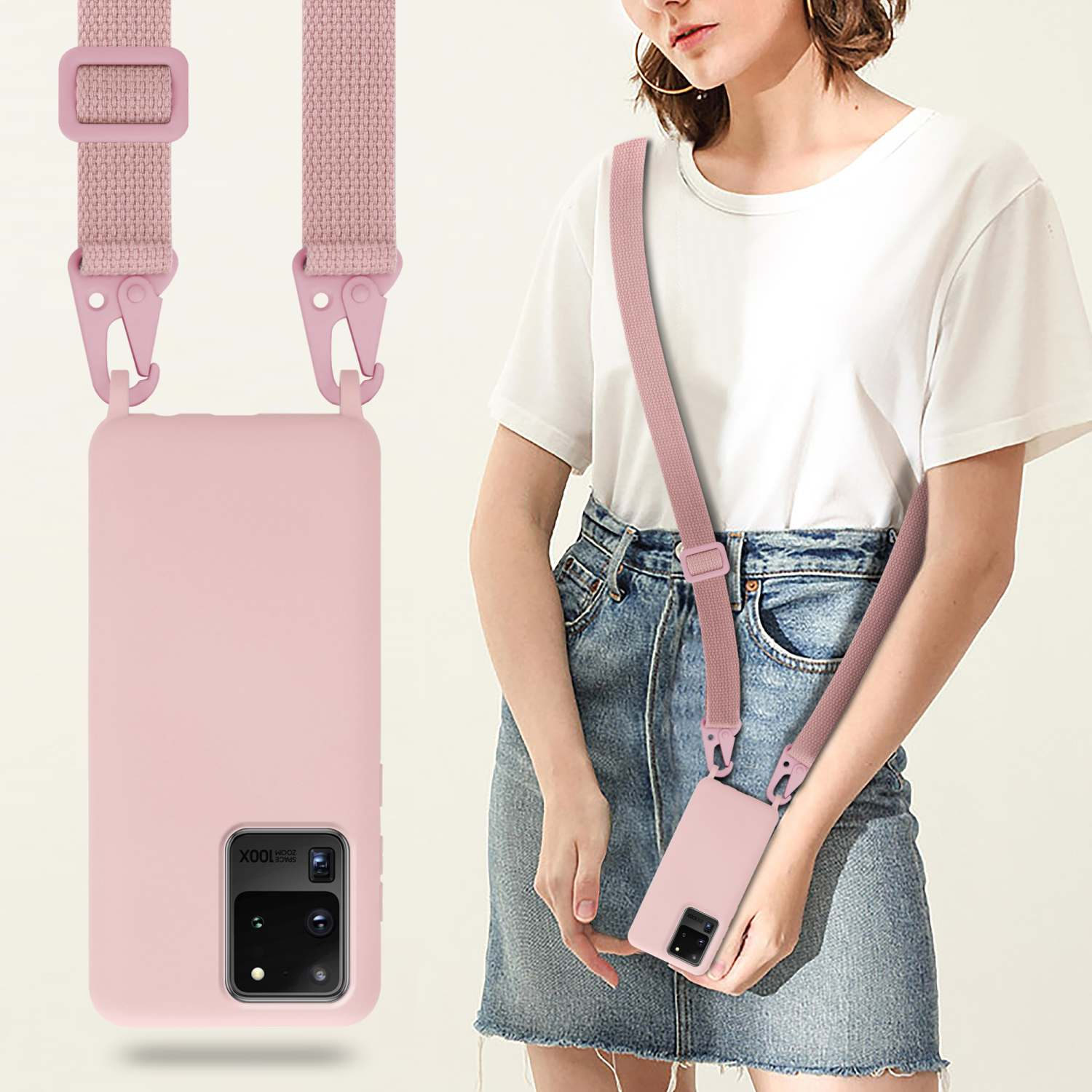 Donna con custodia rosa e cinturino. Telefono appeso. Camicia bianca e gonna blu.