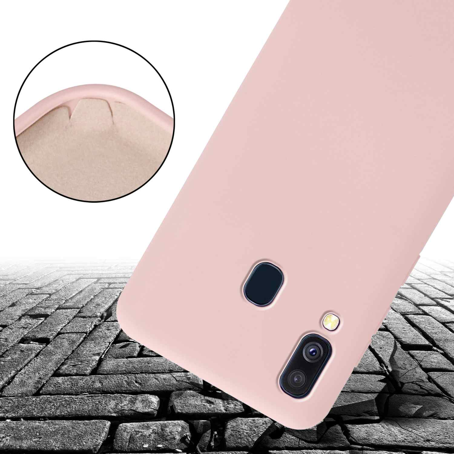 Custodia rosa con telefono. Sfondo di mattoni grigi. Testo: Protezione dalle cadute.
