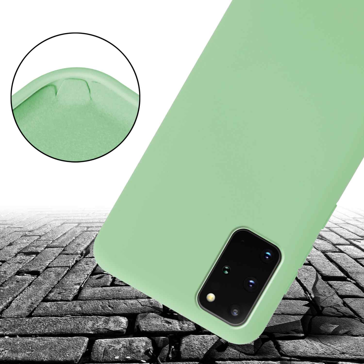 Custodia per telefono verde che cade su terreno rotto. La funzione antiurto è l'evidenza.