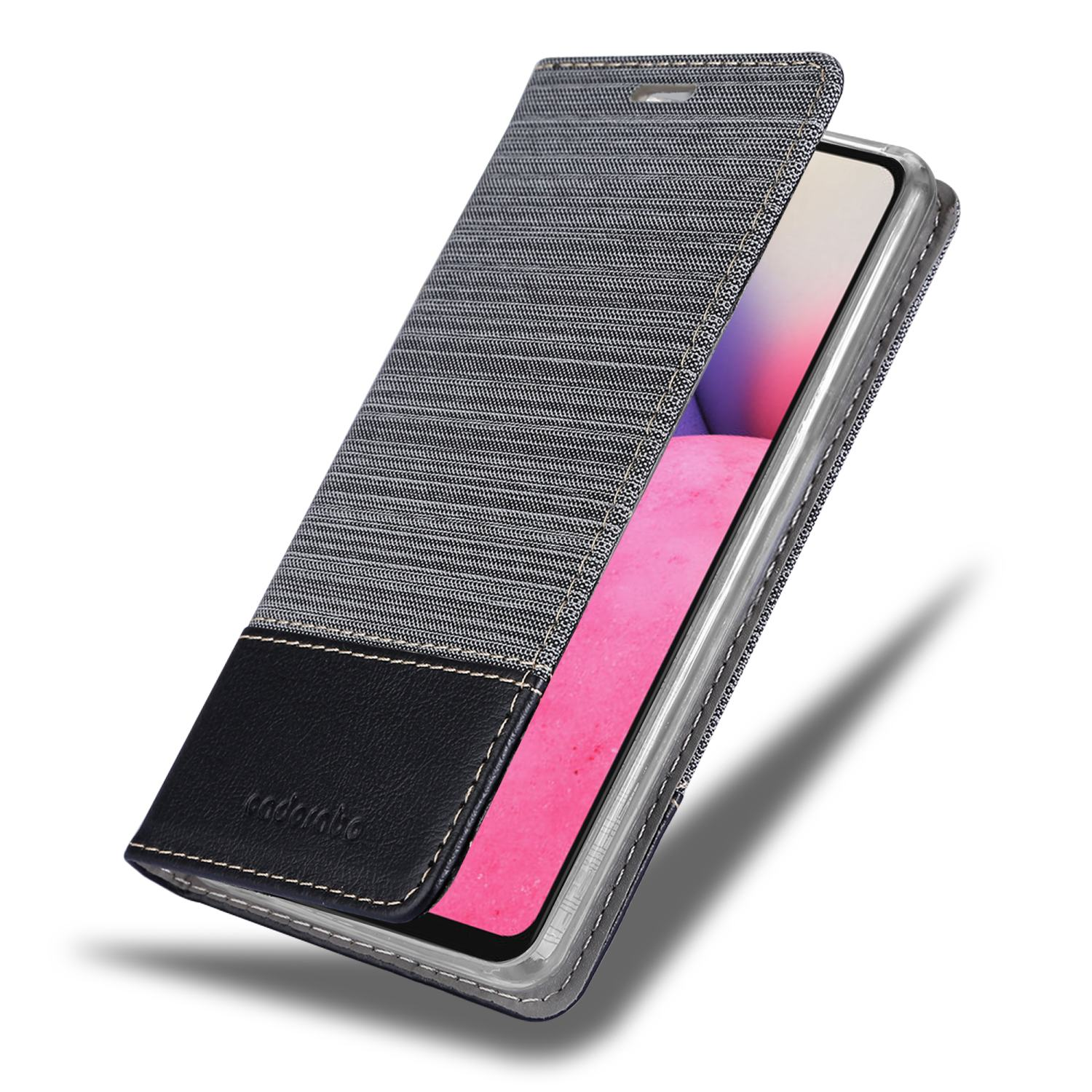 Grau-schwarze Handyhülle mit offener Abdeckung über einem Telefon. Telefon zeigt pinken Bildschirm.