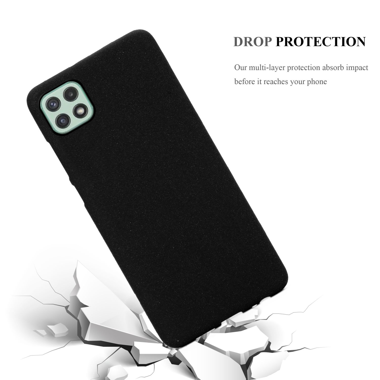 Custodia per telefono nera, che cade. Viene mostrata una superficie incrinata con la cover e il telefono.