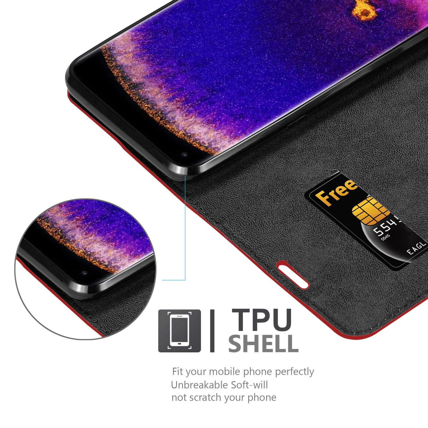 Telefono nero con una carta. Il telefono è all'interno di una custodia rossa e nera. Viene mostrato il testo TPU SHELL.