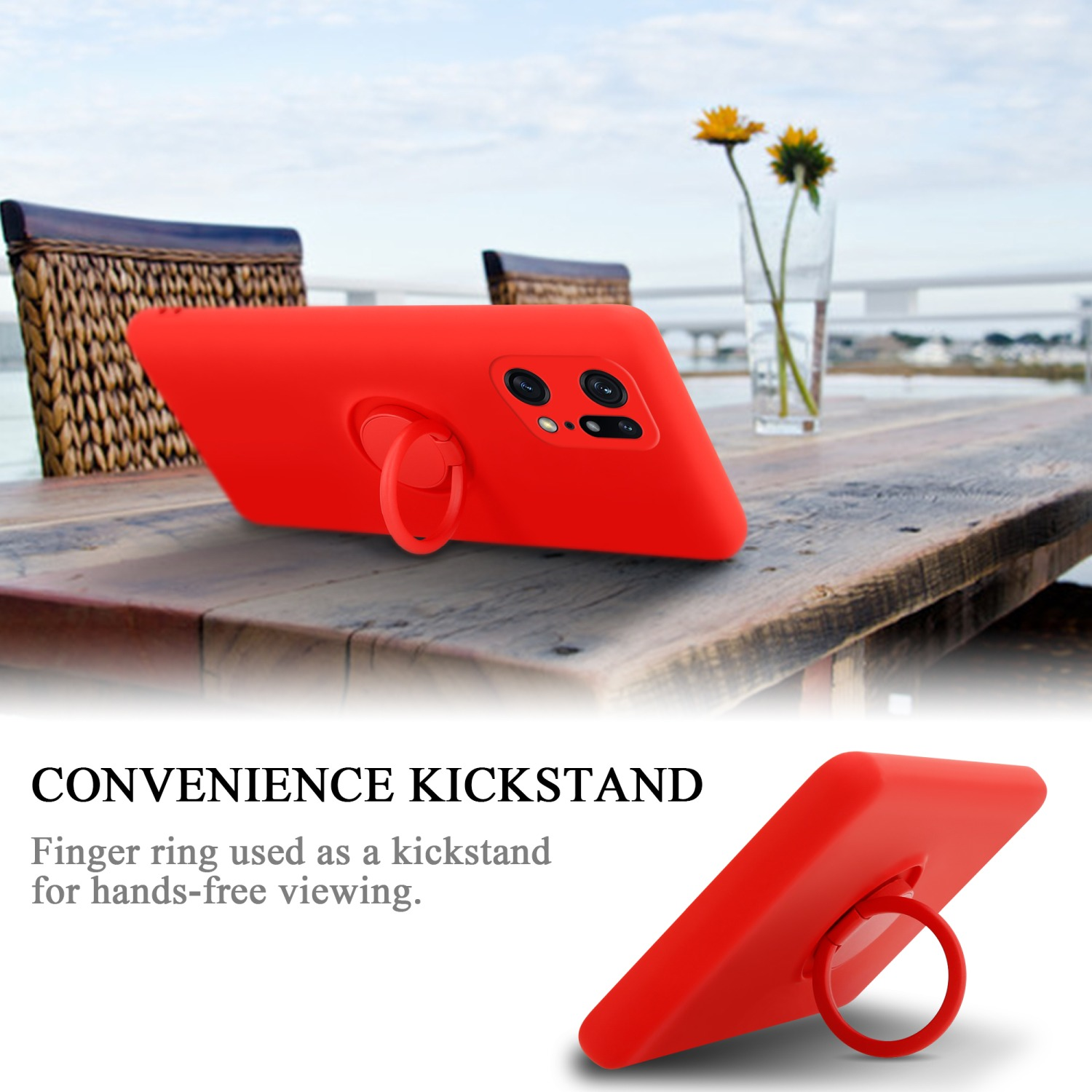 Custodia rossa con anello per telefono come supporto su tavolo in legno, sfondo mare e fiori.