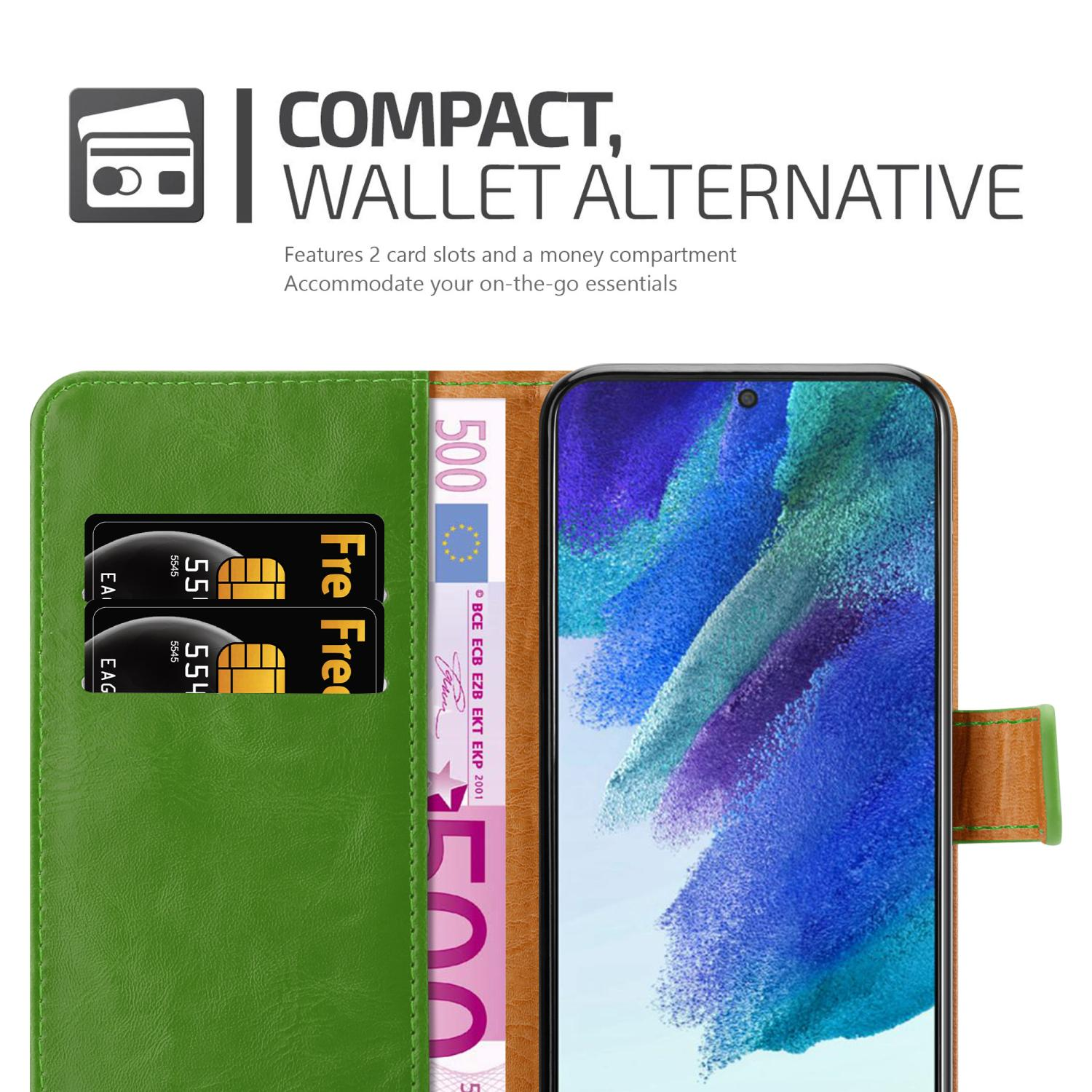 Eine grüne Brieftasche geöffnet, zeigt Karten und Euro-Scheine, mit einem Telefon darin.