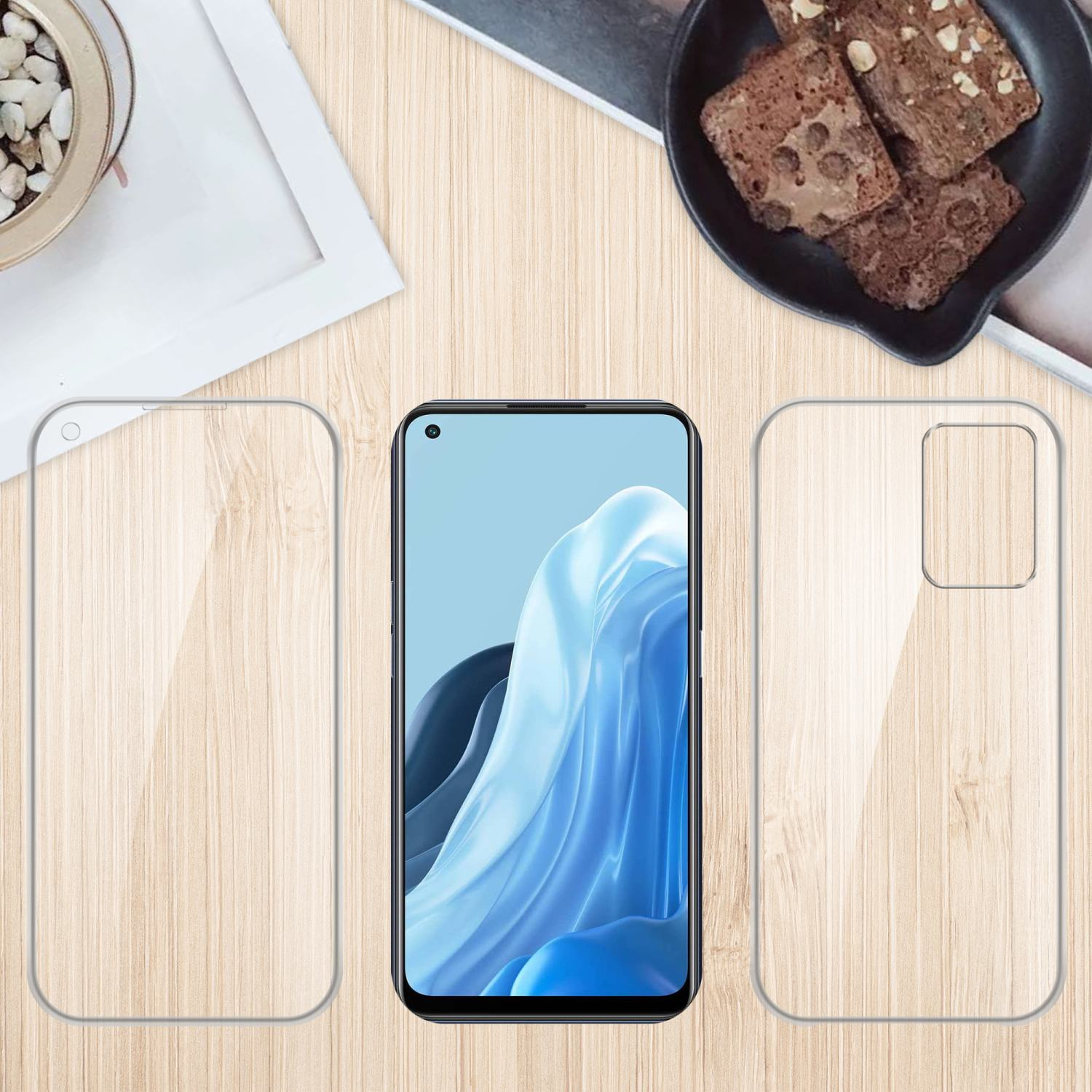 Telefon mit Displayschutzfolie und zwei weiteren Schutzfolien auf einem Holztisch. Essen oben.