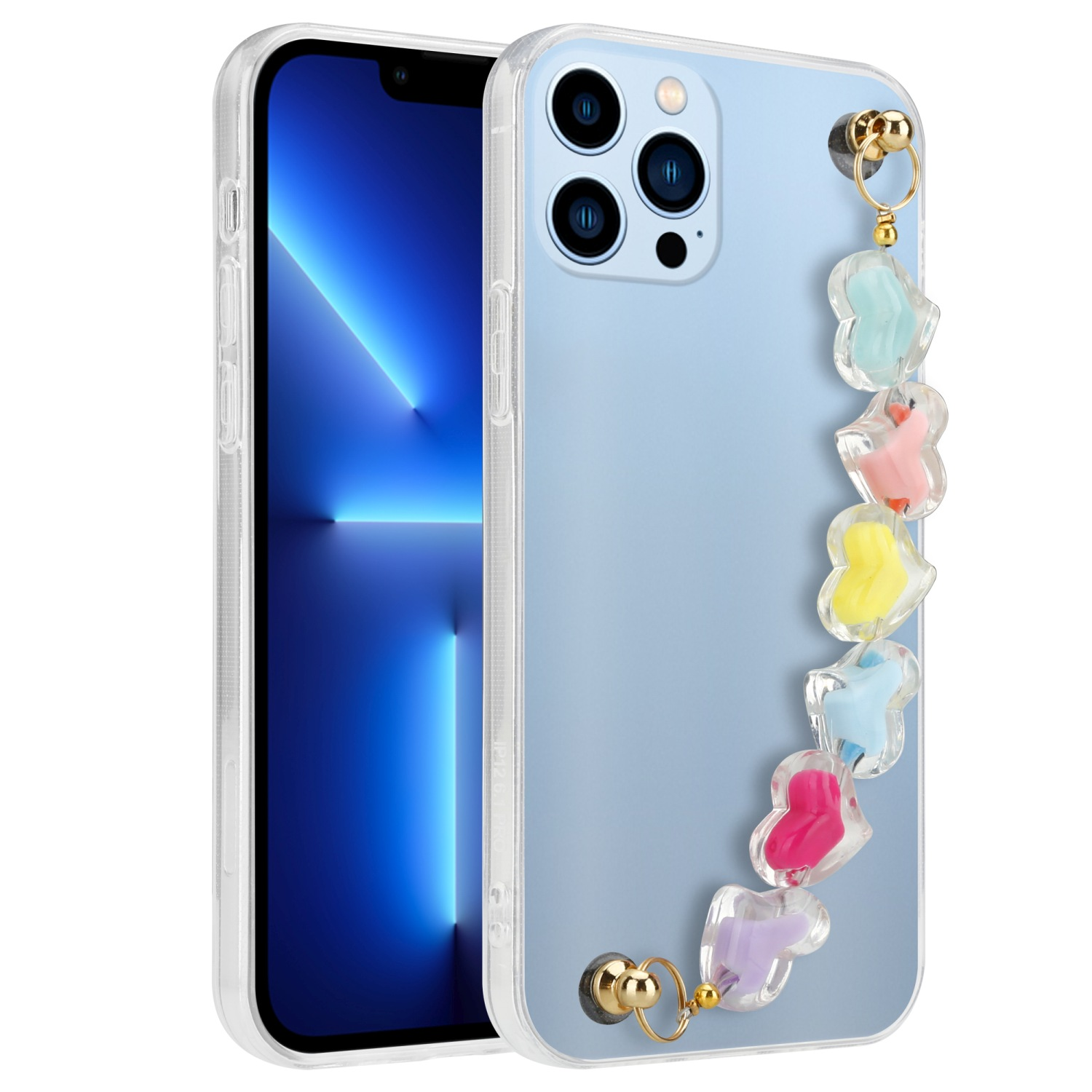 Transparente Handyhülle mit blauem Telefon im Inneren. Die Hülle hat einen bunten herzförmigen Anhänger. Goldfarbene Hardware.