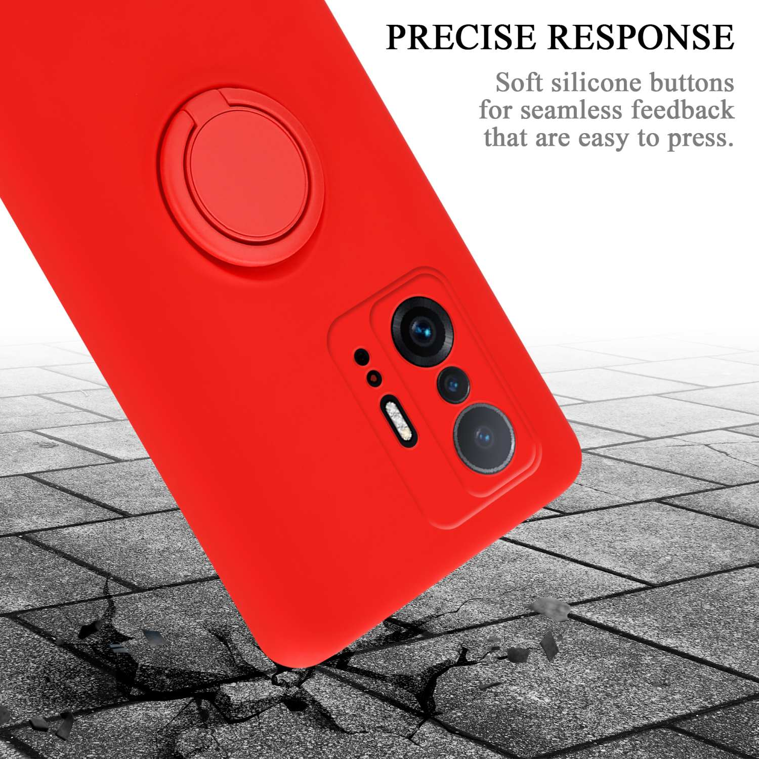 Una custodia per telefono rossa con un supporto ad anello. Lo sfondo è una superficie grigia strutturata con piccoli detriti di pietra.