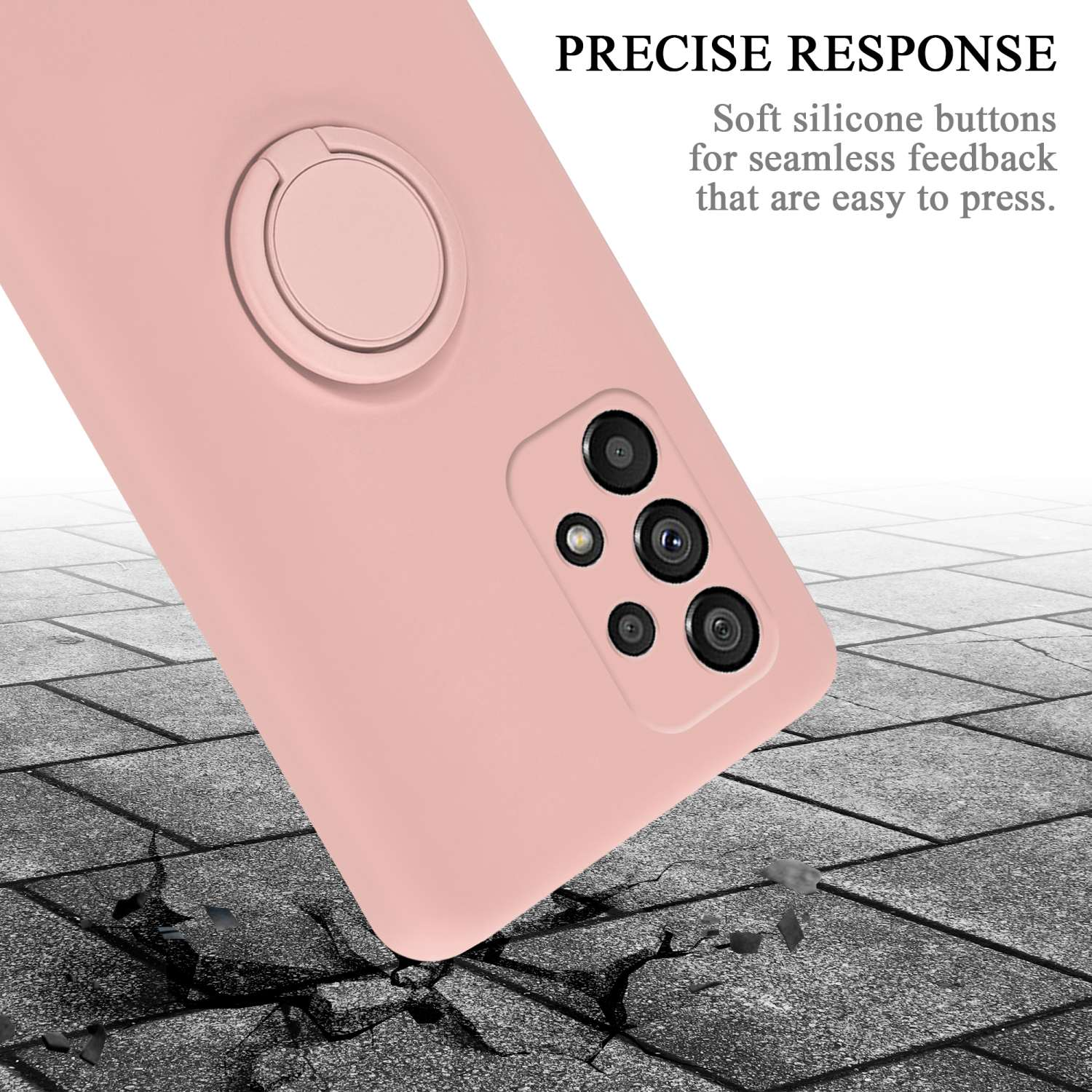 Una custodia per telefono rosa con un anello, con la parola 'Precise Response' e detriti sul terreno.