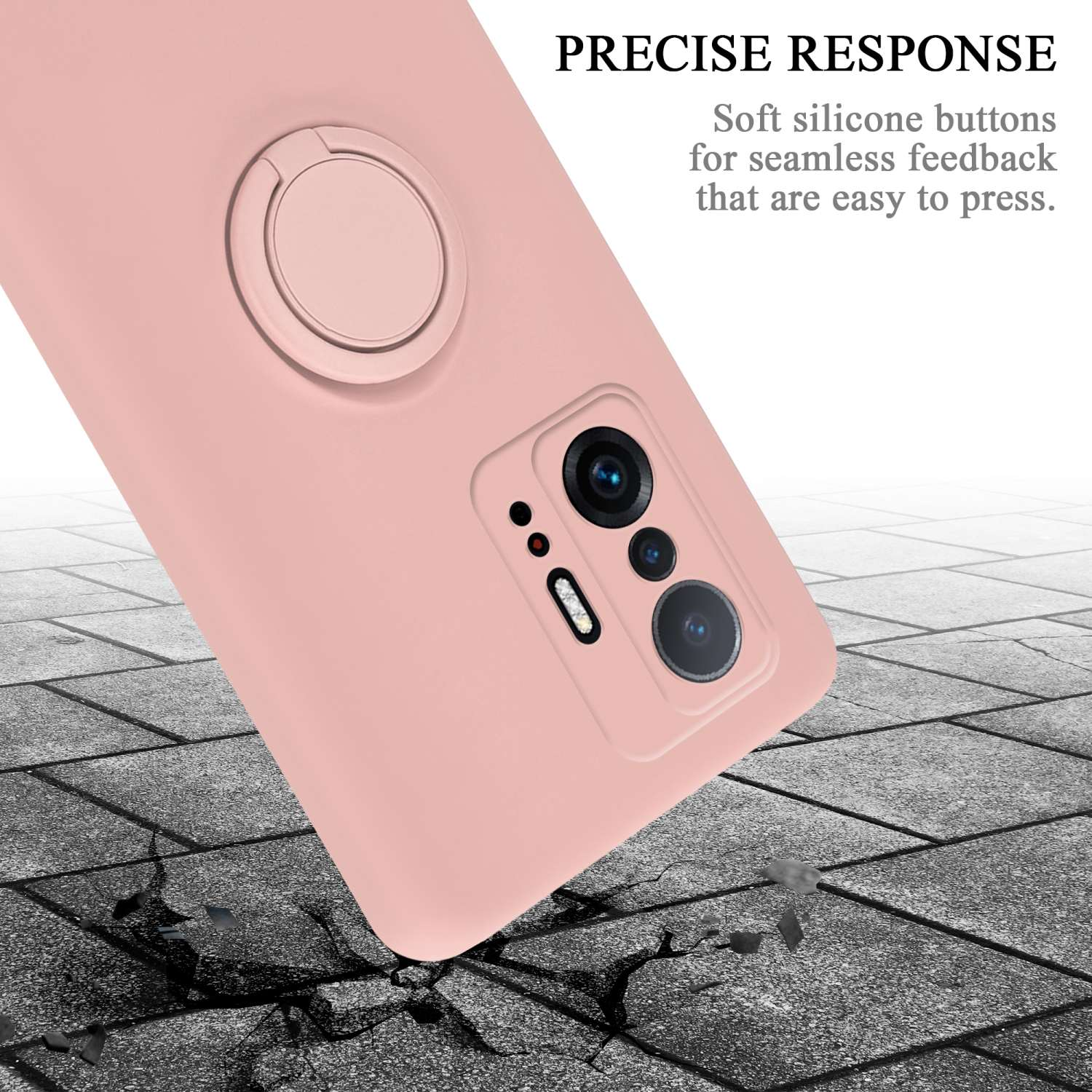 Custodia per telefono rosa con supporto ad anello, su un terreno grigio strutturato con una leggera angolazione.