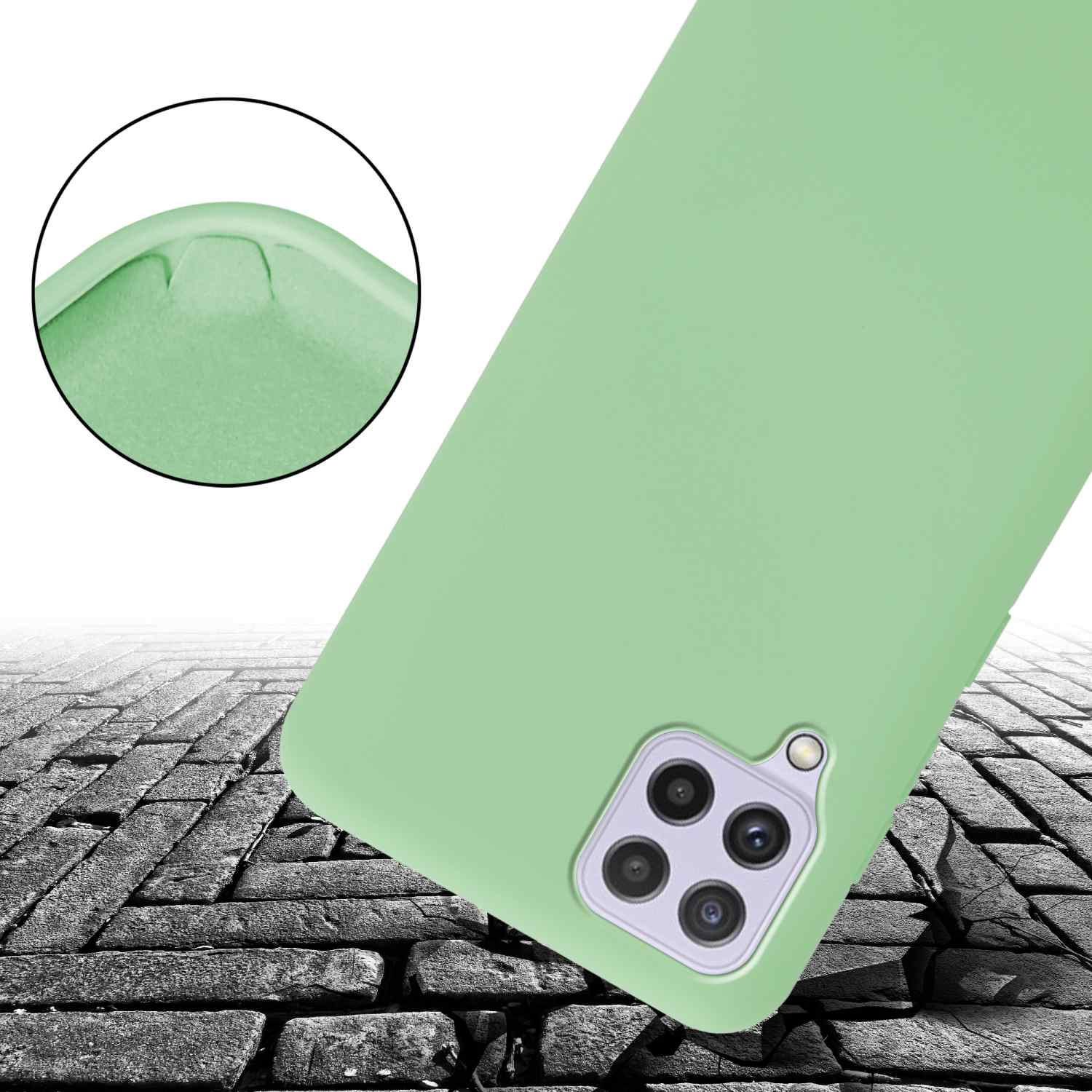 Custodia per telefono verde chiaro con telefono. La custodia è su una superficie di mattoni. Dettagli della fotocamera visibili.