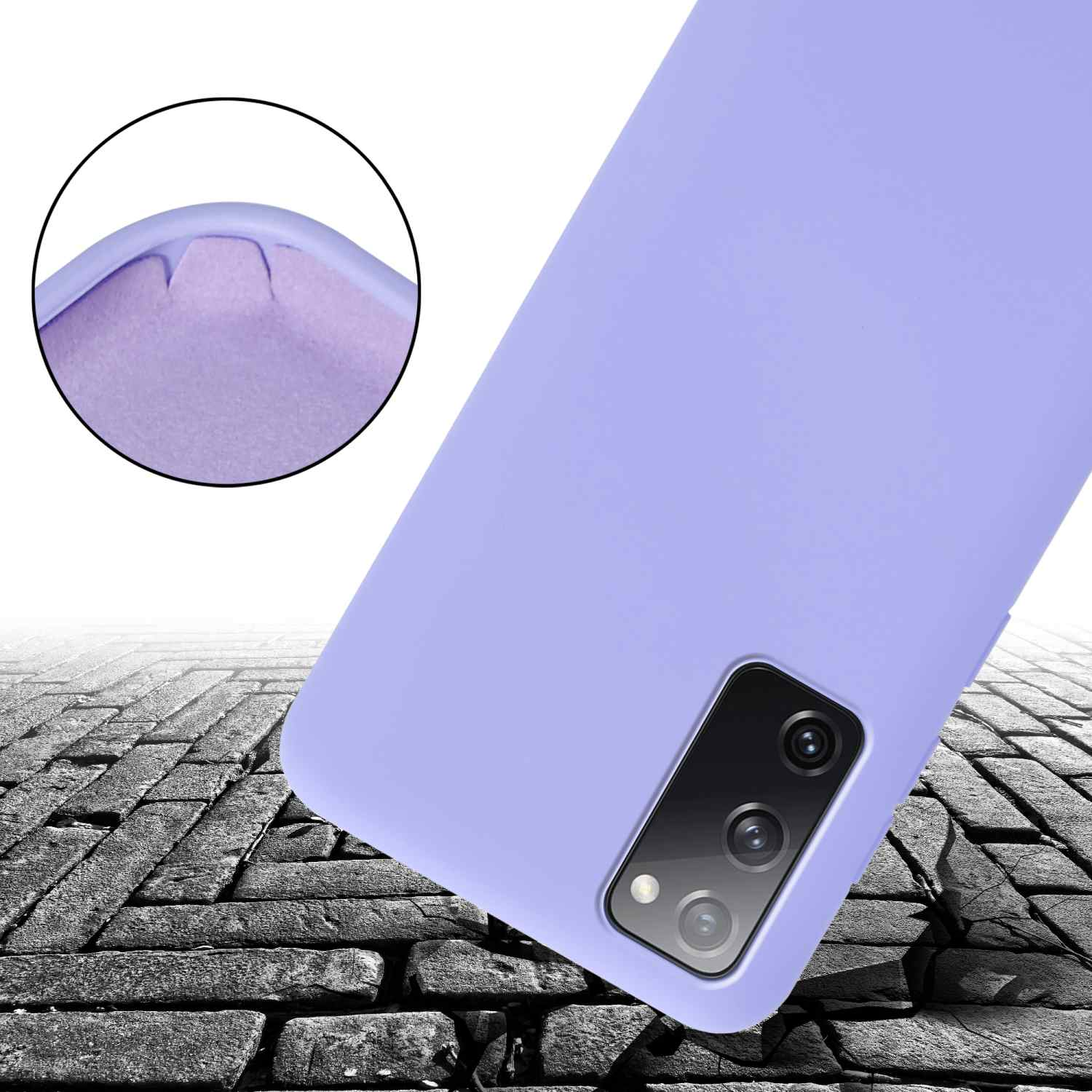 Custodia del telefono viola. Che cade su un pavimento di pietra. Protezione contro le cadute.