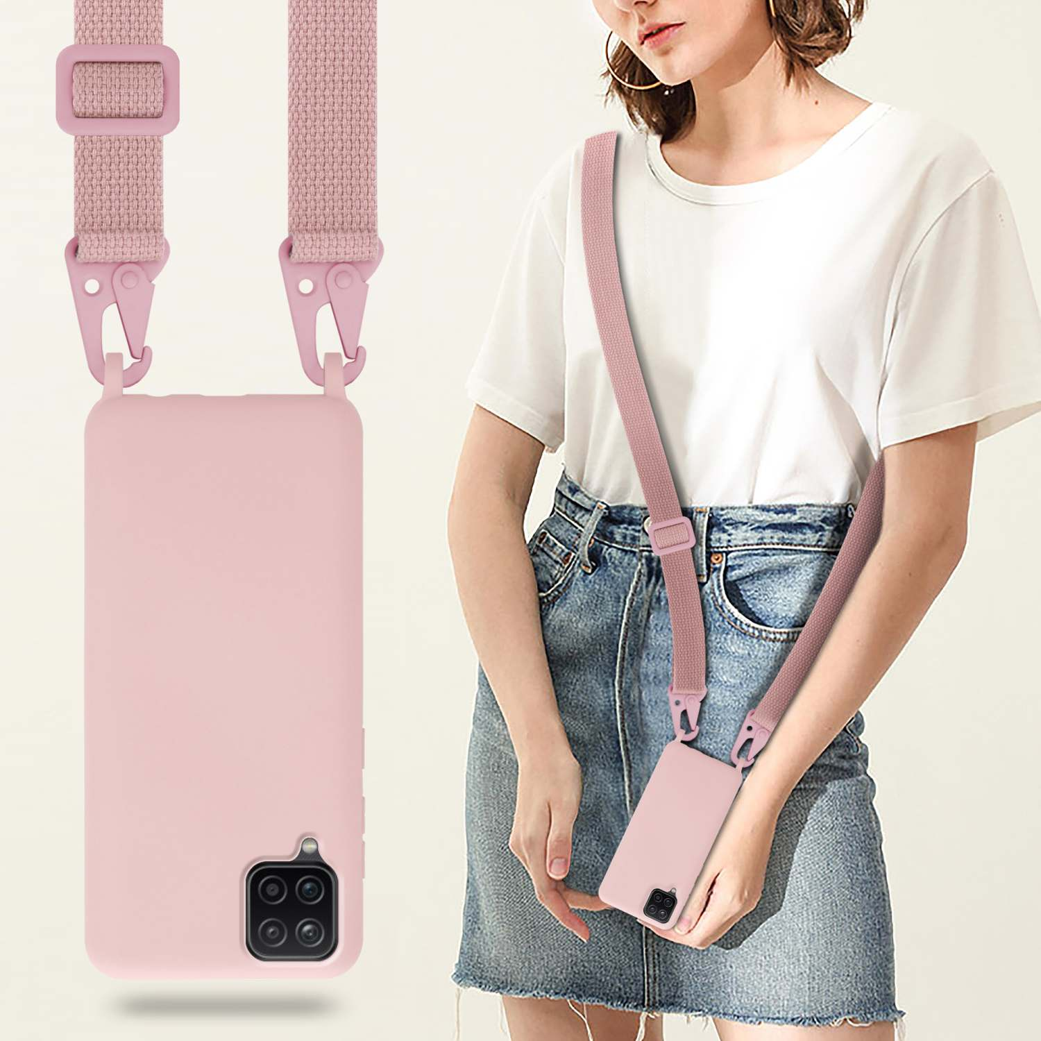 Una donna che indossa una custodia per telefono rosa su una tracolla rosa. La custodia del telefono è rosa. Indossa una camicia bianca.