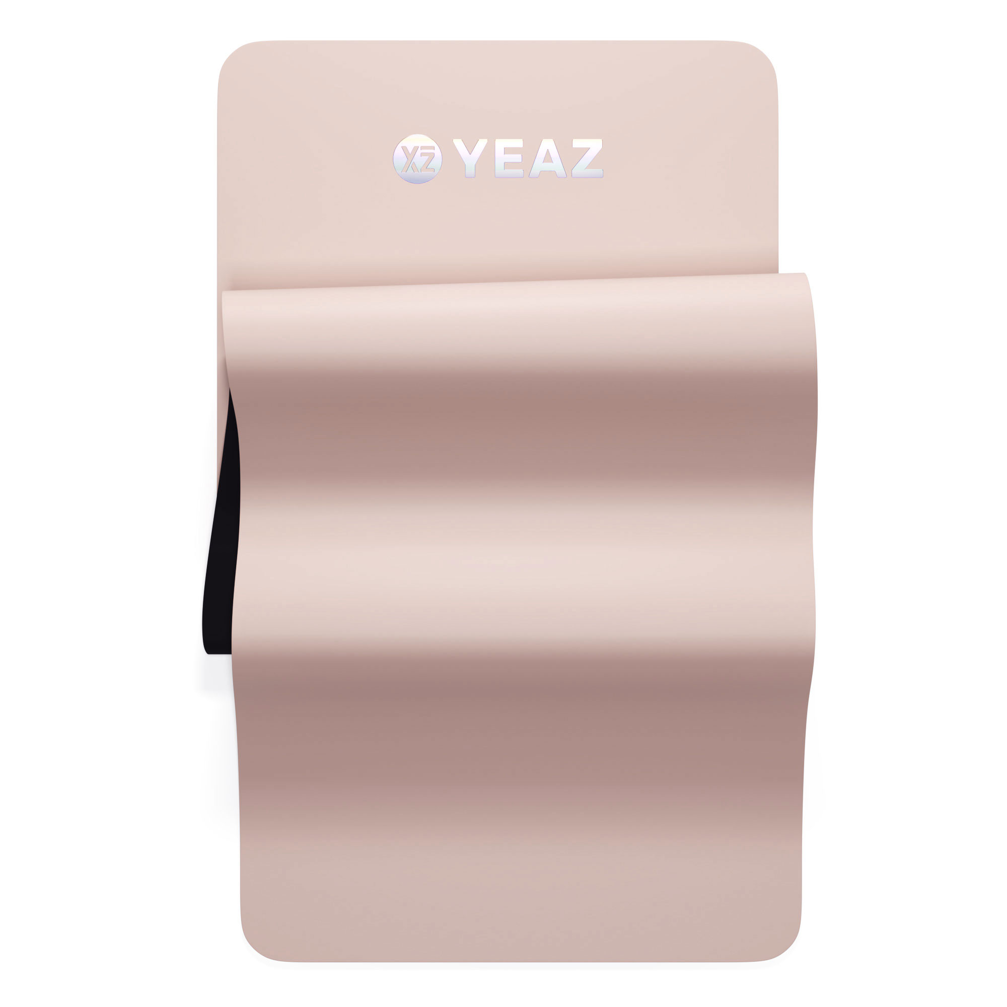 Gerollte rosa Yogamatte mit weißem YEAZ-Logo. Schwarze Unterseite sichtbar.