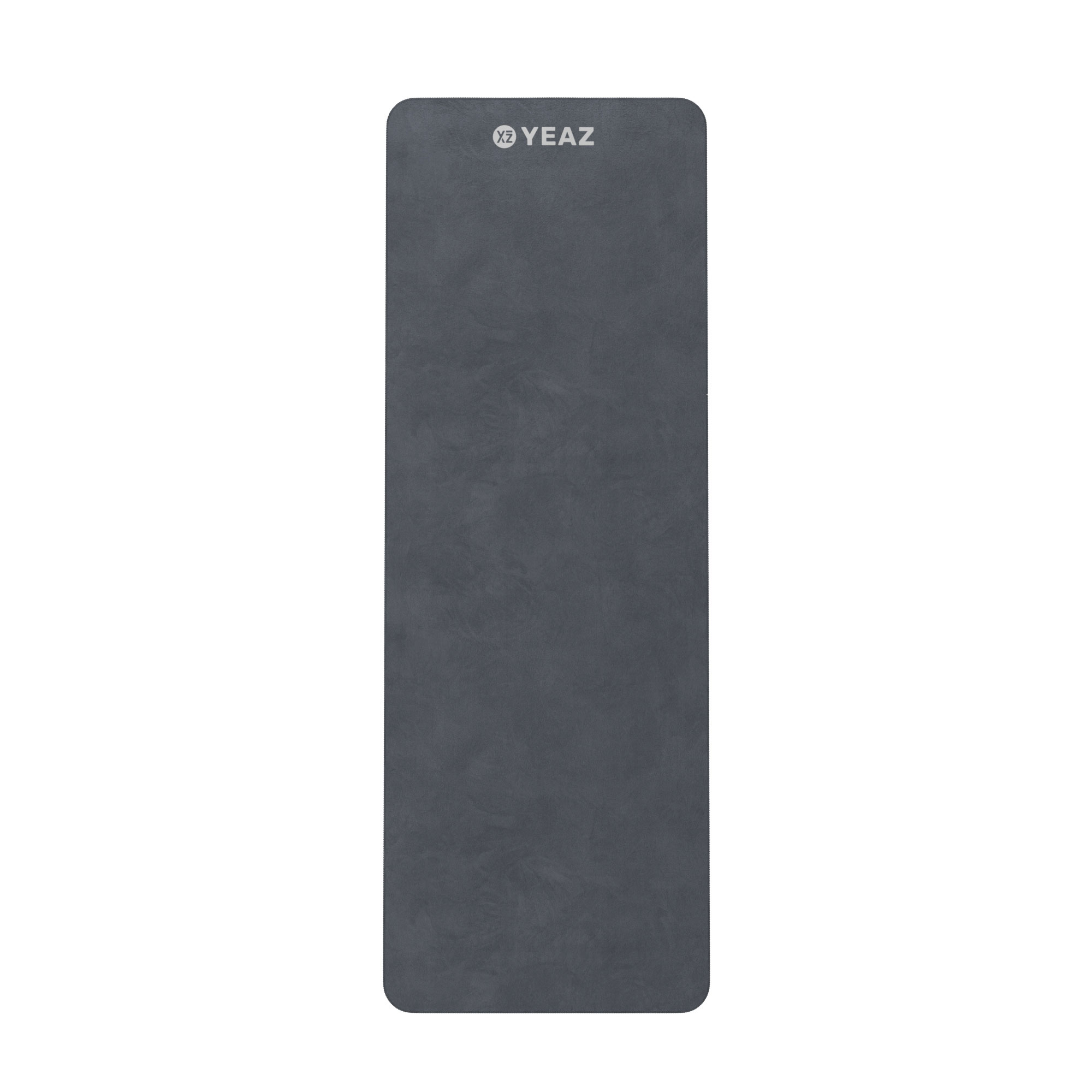 Graue Yogamatte. Markenname 'YEAZ' sichtbar.