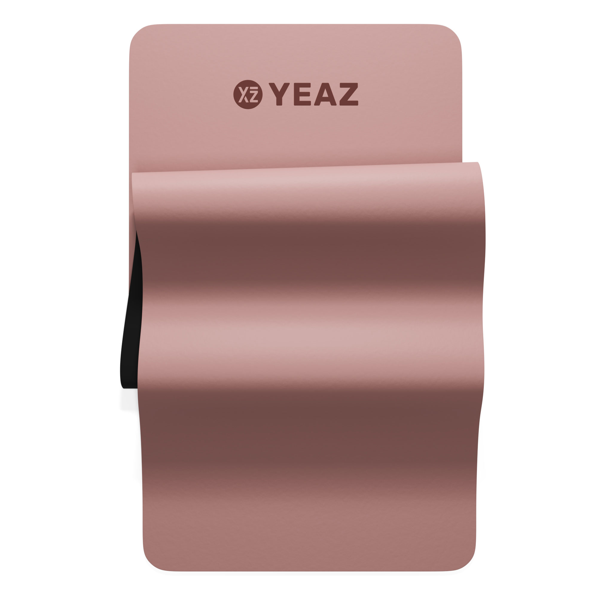 Gefaltete rosa Yogamatte mit schwarzer Unterseite. Der Markenname 'YEAZ' steht oben.