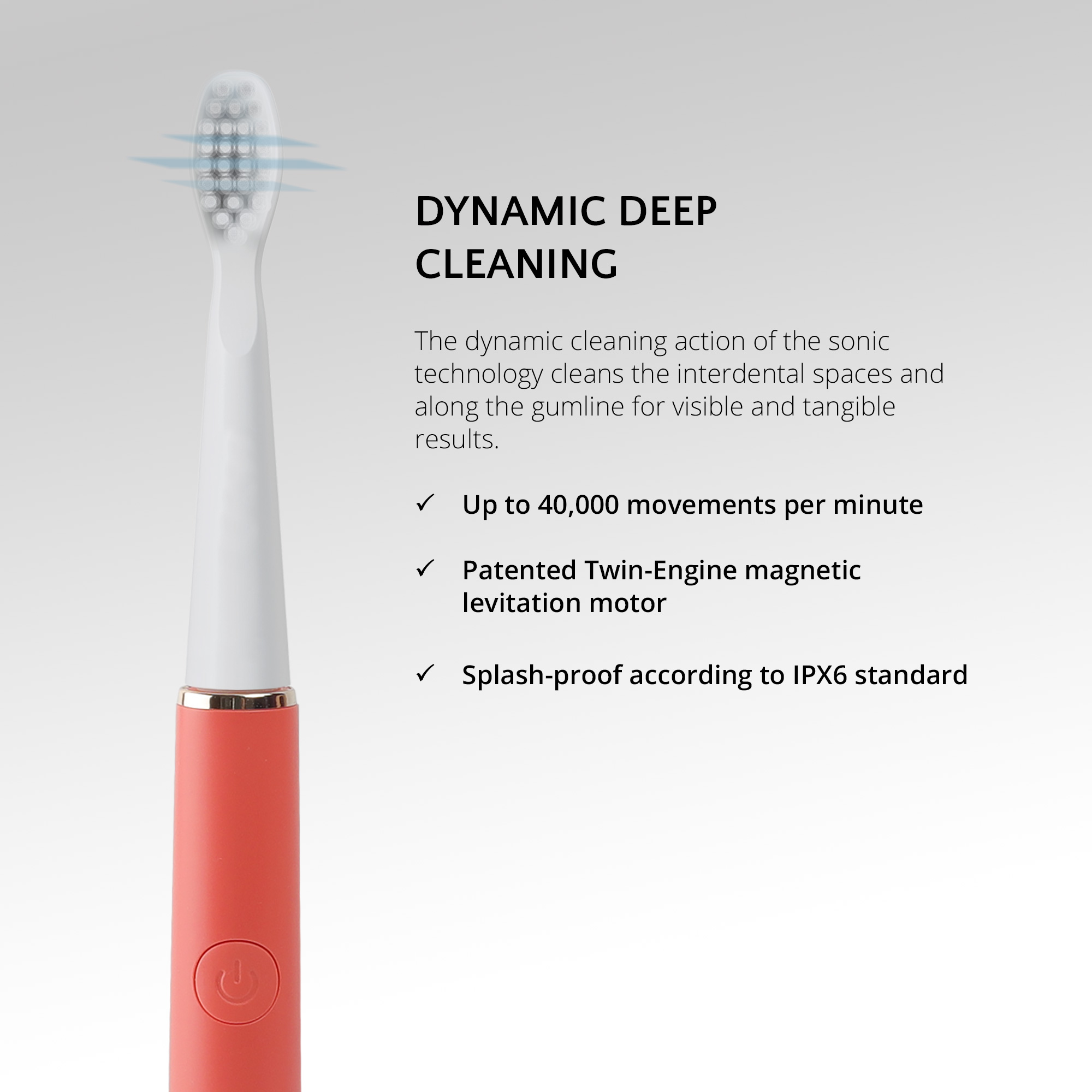 Un cepillo de dientes eléctrico con cabezal blanco y mango color coral.