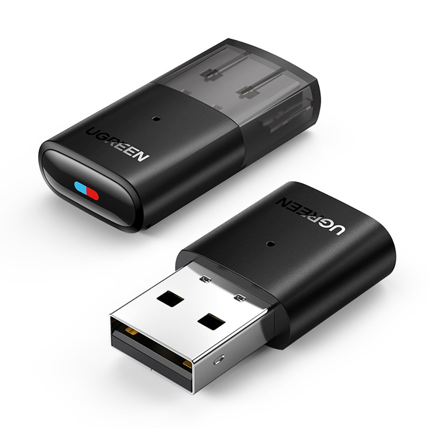 Dwa urządzenia USB UGREEN. Jedno to adapter USB, drugie to odbiornik USB. Czarny kolor.