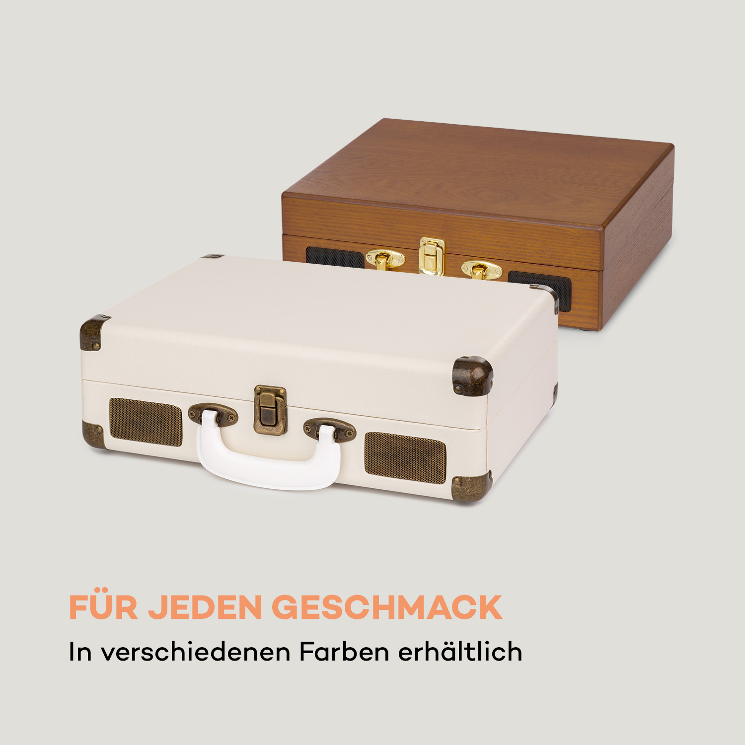Zwei Plattenspieler im Vintage-Stil, einer weiß, einer braun. Text sagt: „FÜR JEDEN GESCHMACK“.