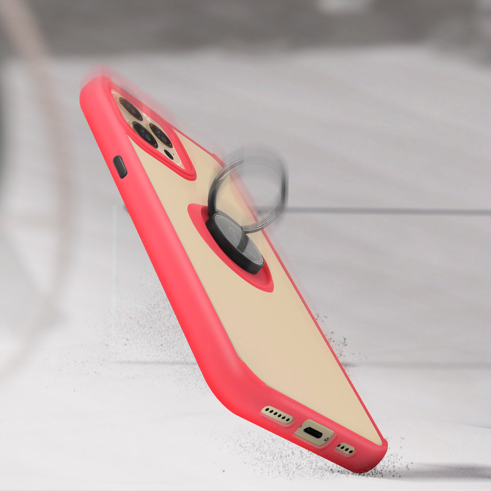 Custodia per telefono rossa e beige con supporto ad anello, in caduta.
