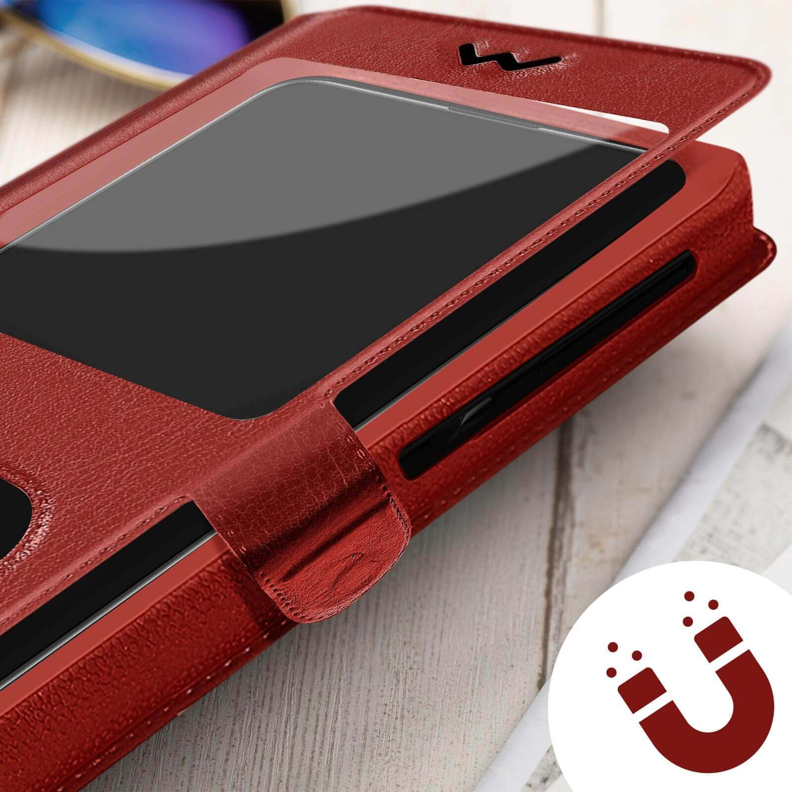 Un étui de téléphone rouge avec une couverture, montrant un téléphone à l'intérieur et un symbole de fermeture magnétique.