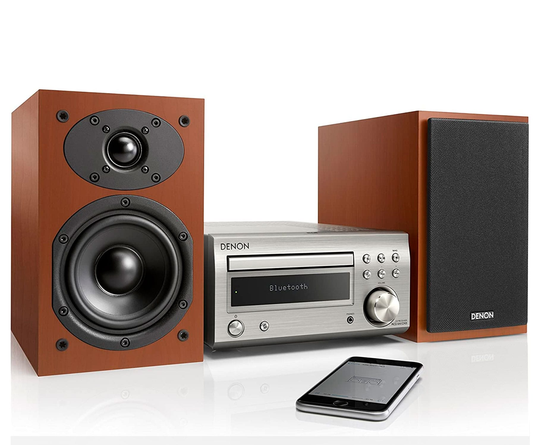 Un equipo de música con dos altavoces, un reproductor y un smartphone.