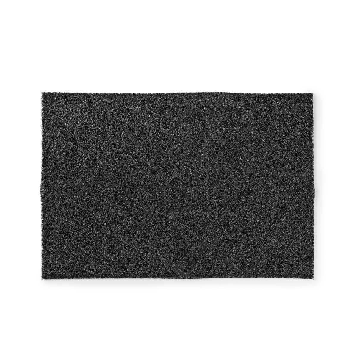 A black, grainy, rectangular pad on a white background, showing texture.