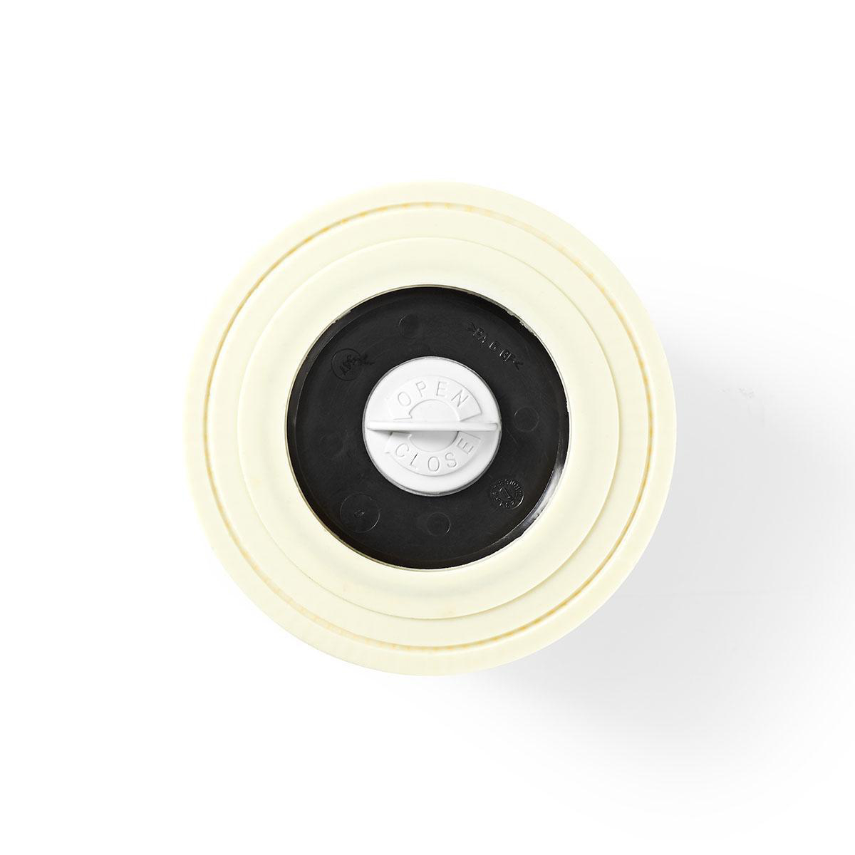 A cream-colored filter with an open/close dial, seen from above, on white.