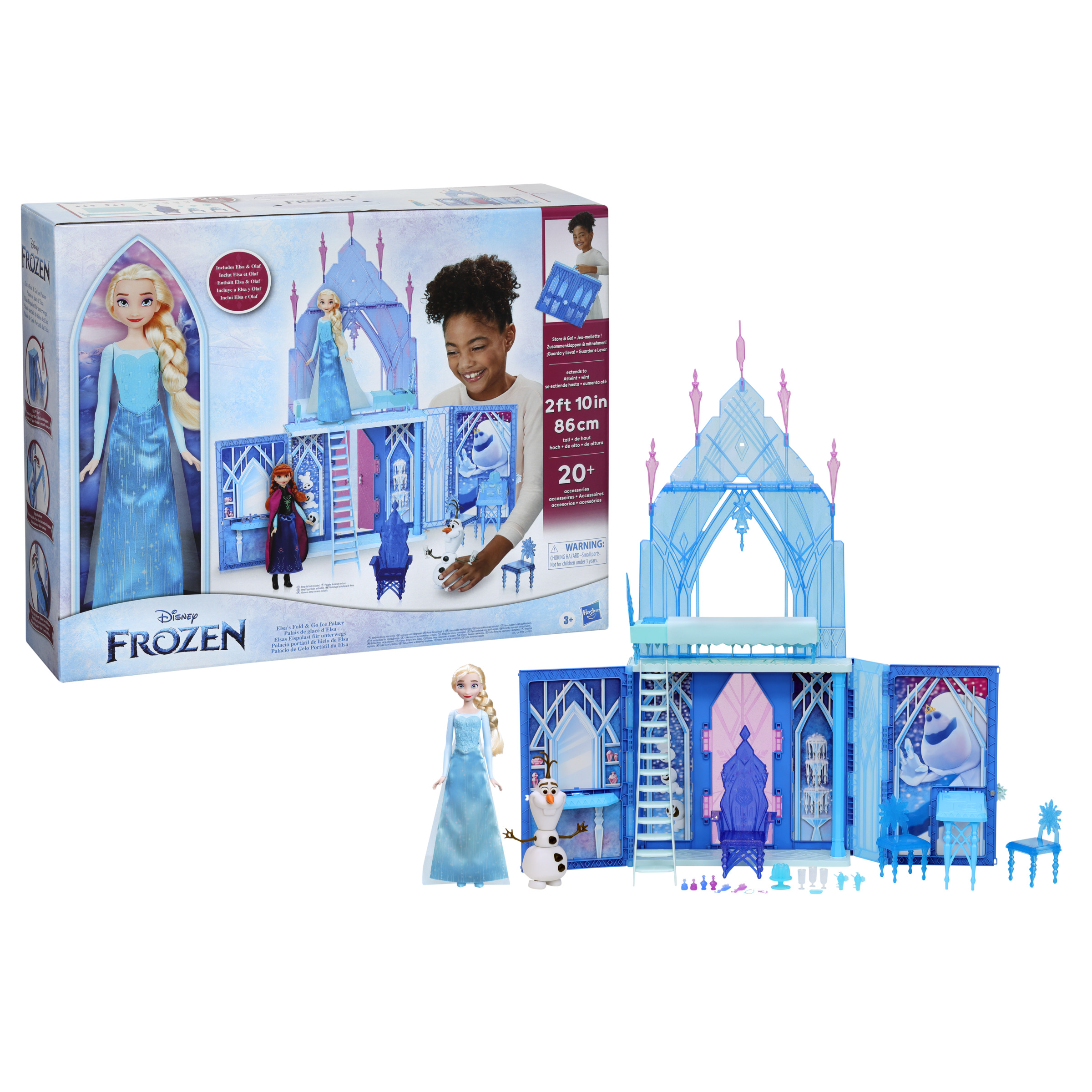 Un playset a tema Frozen con una bambola, un castello e altri accessori. Una bambina sta giocando con il set.