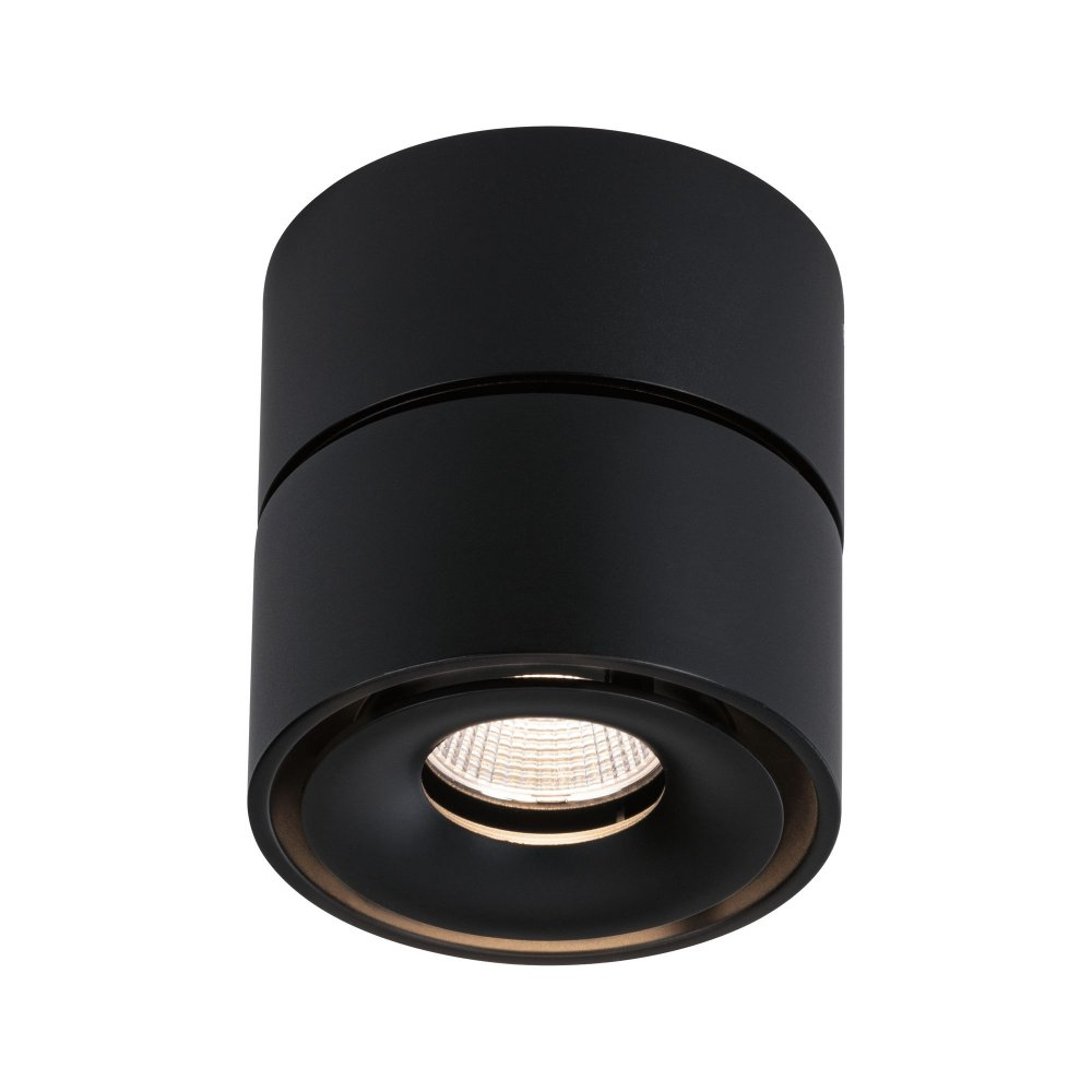 Apparecchio di illuminazione a incasso cilindrico nero.