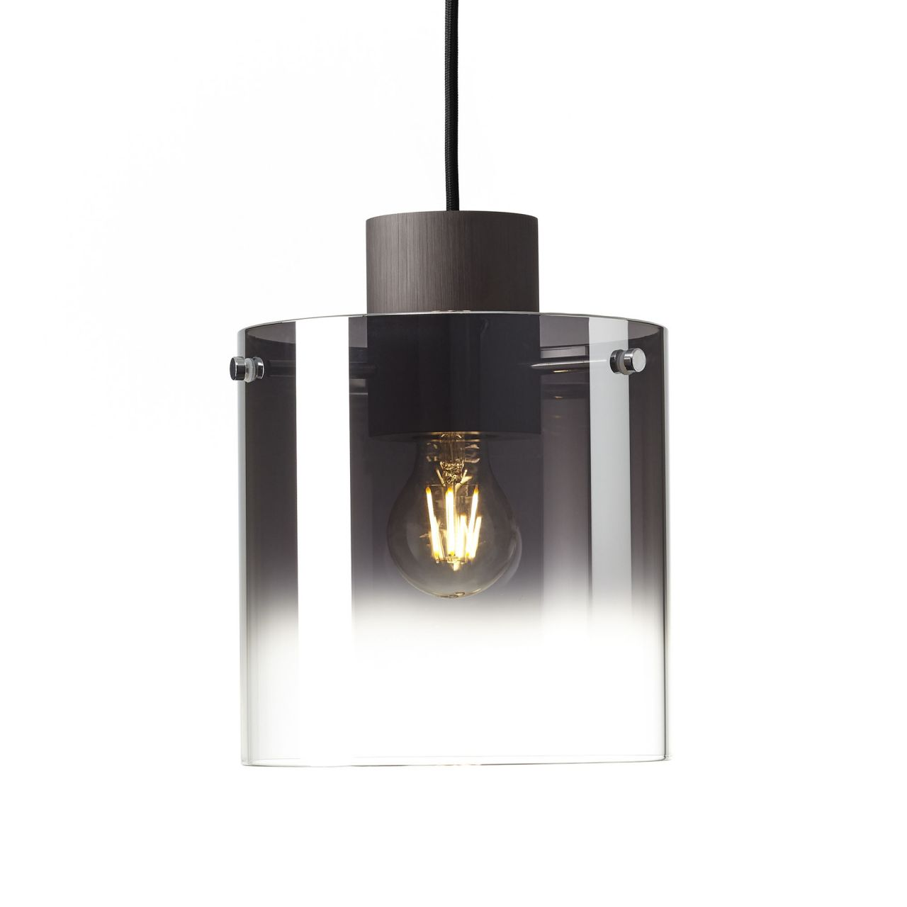 Eine zylindrische Pendelleuchte mit dunklem Holzsockel und rauchigem Glas.