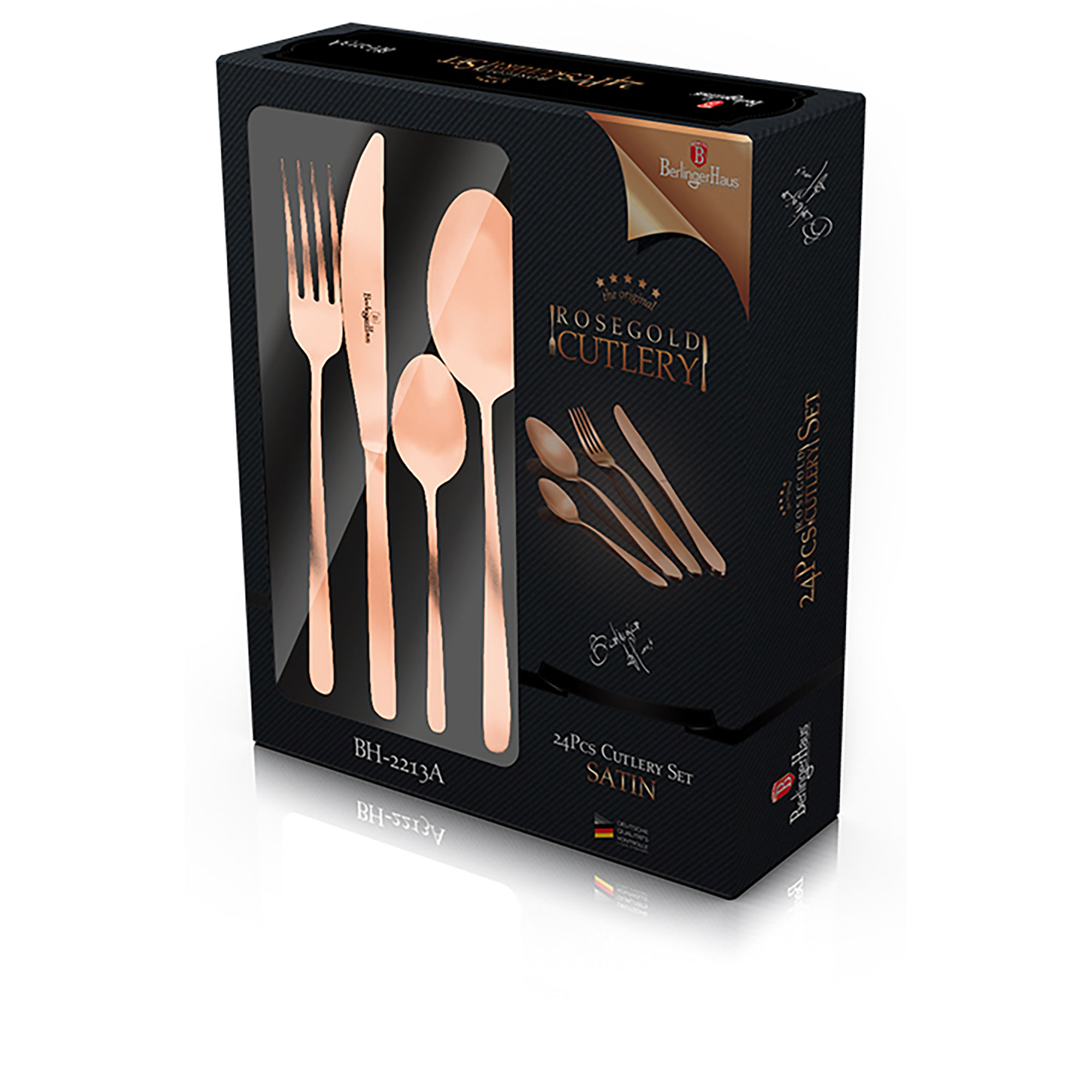 Un juego de cubiertos de oro rosa en una caja negra. El juego incluye tenedor, cuchillo, cuchara y cucharas pequeñas.