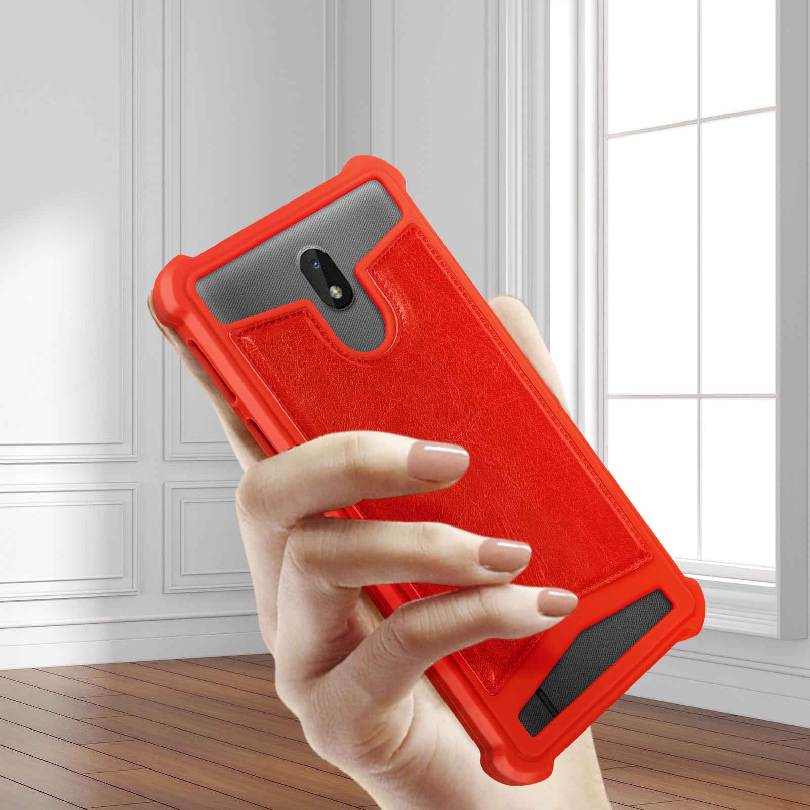 Mano che tiene una custodia per telefono rossa e grigia con design a portafoglio.