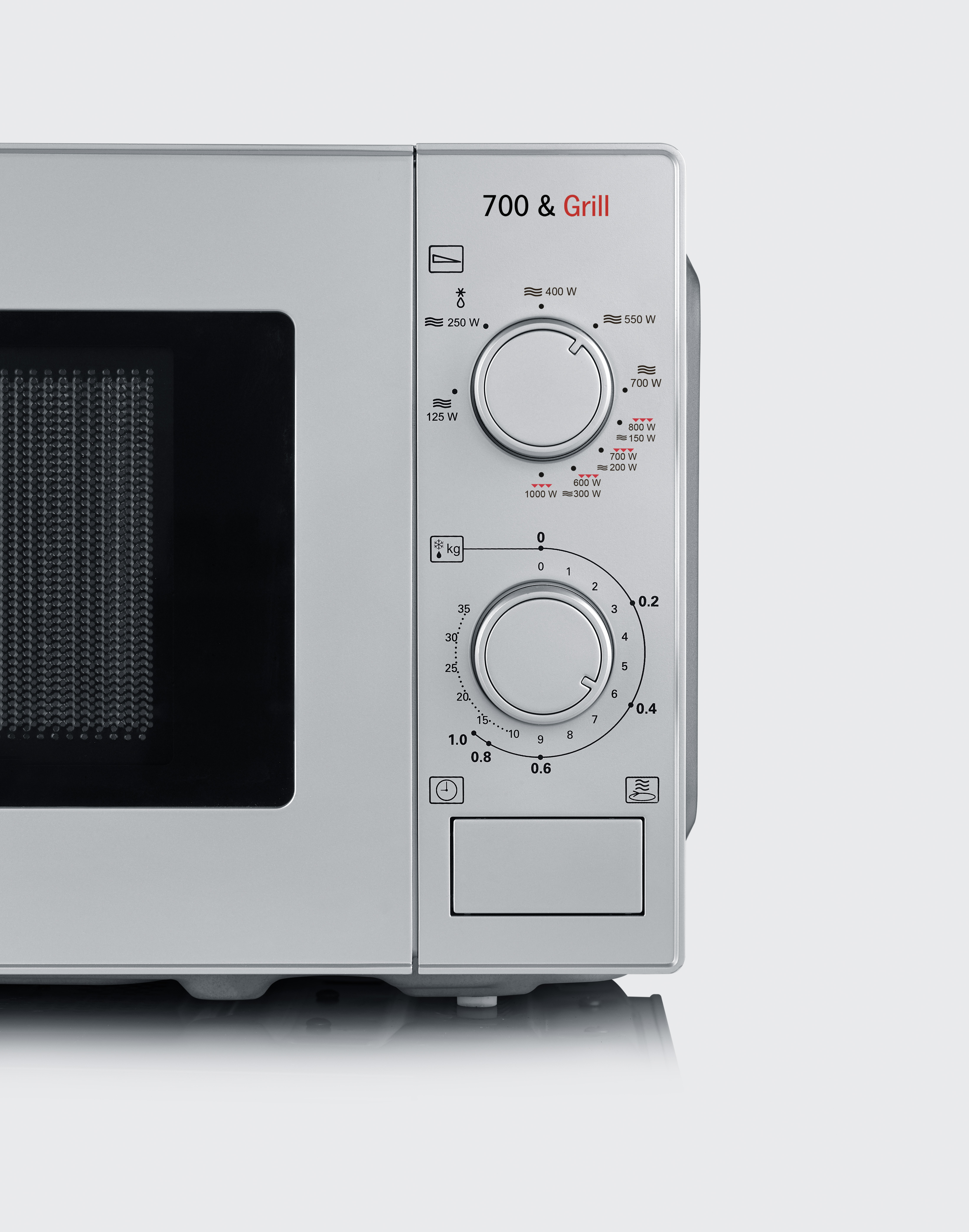 A microwave oven with control knobs and a digital display.