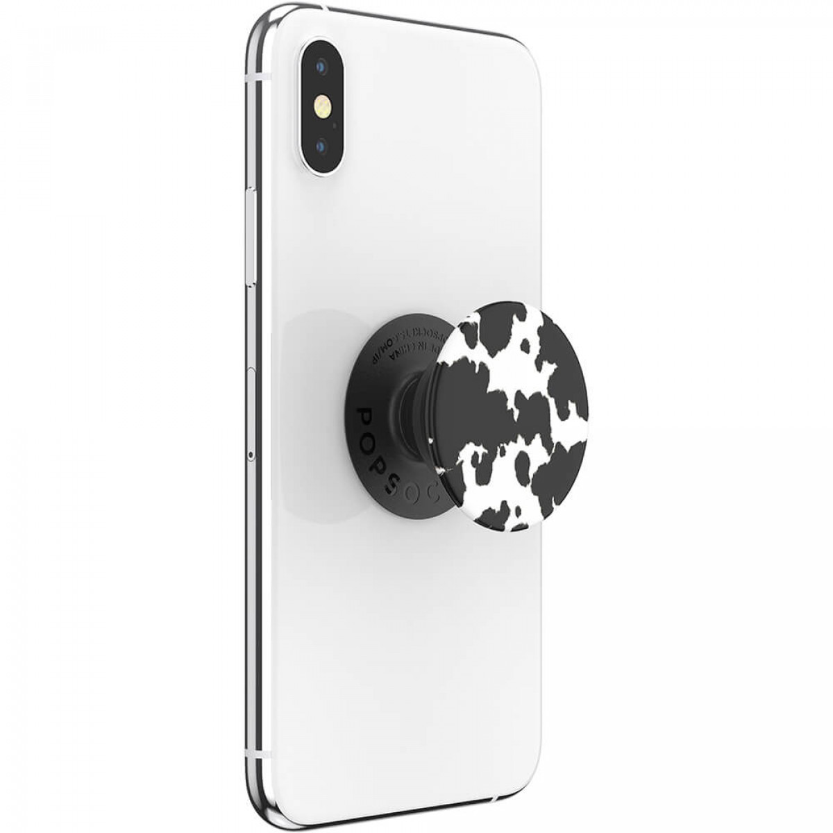 Ein weißes Telefon mit einem Kuhmuster-Handygriff wird angezeigt.