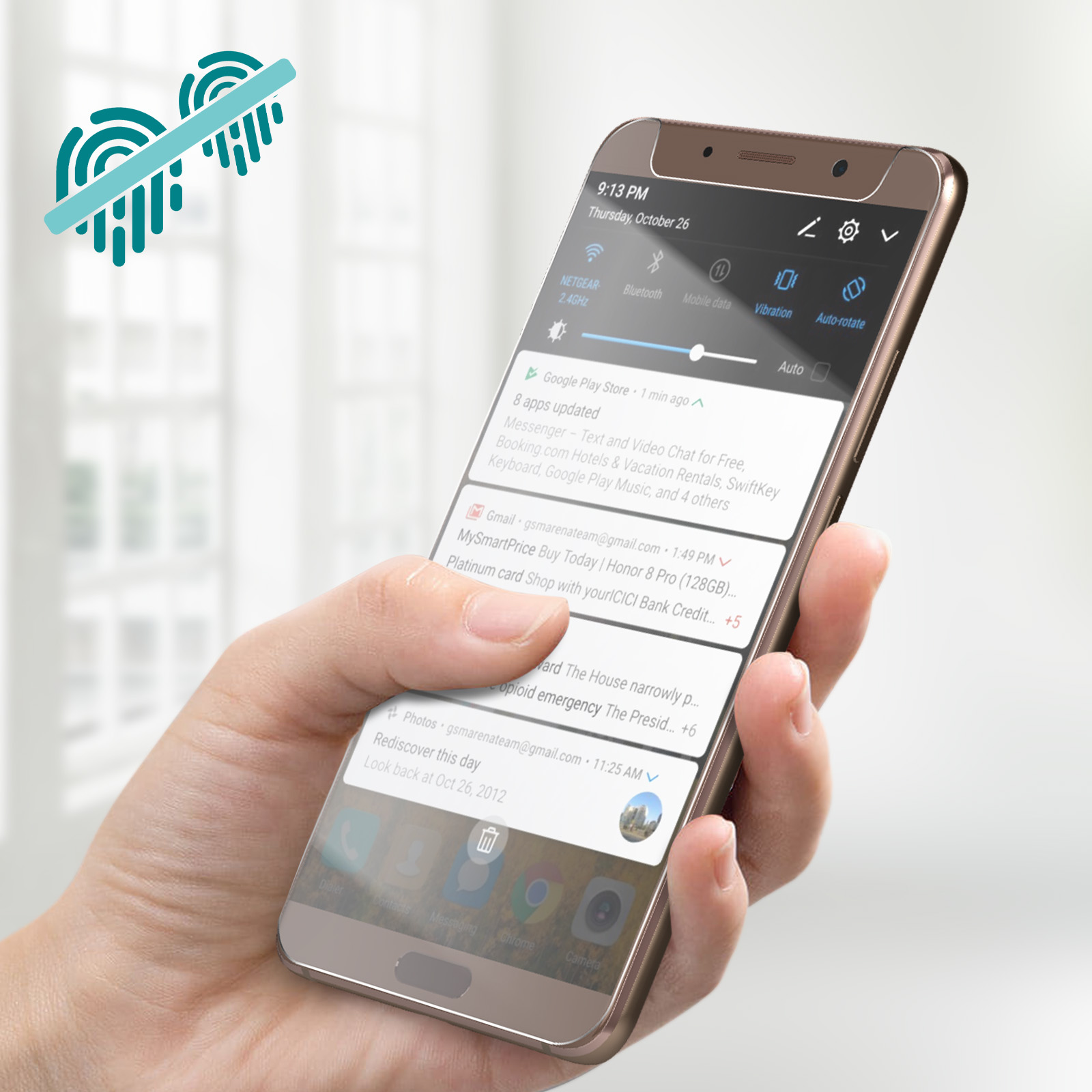 Una persona tiene in mano un telefono dorato che mostra uno schermo con notifiche di app.
