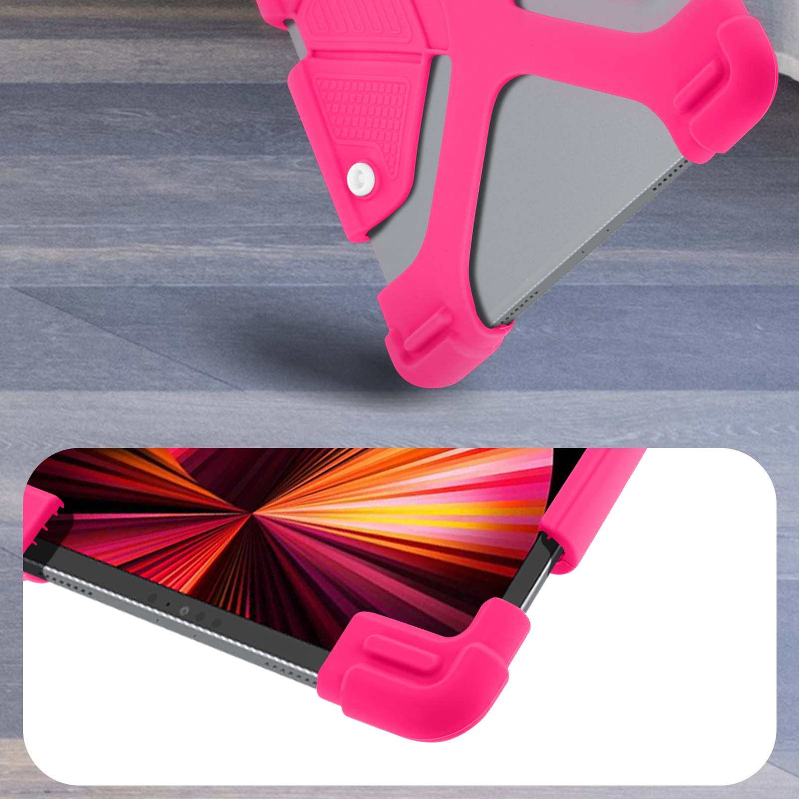 Tablet in pinkfarbener Hülle, Nahaufnahme. Pinke Ecken sichtbar. Tablet auf grauer Oberfläche.