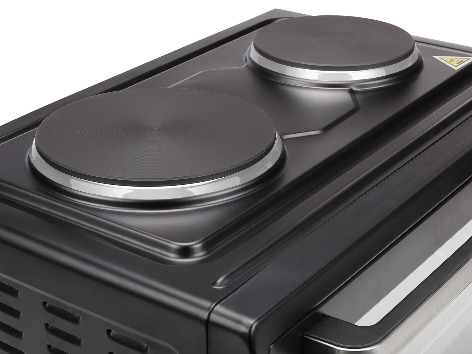 Piano cottura elettrico nero con due elementi riscaldanti circolari.