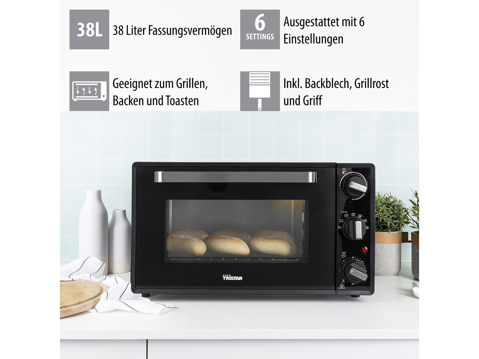 Czarny piekarnik z trzema bochenkami chleba w środku. Tekst wokół piekarnika wskazuje jego funkcje.