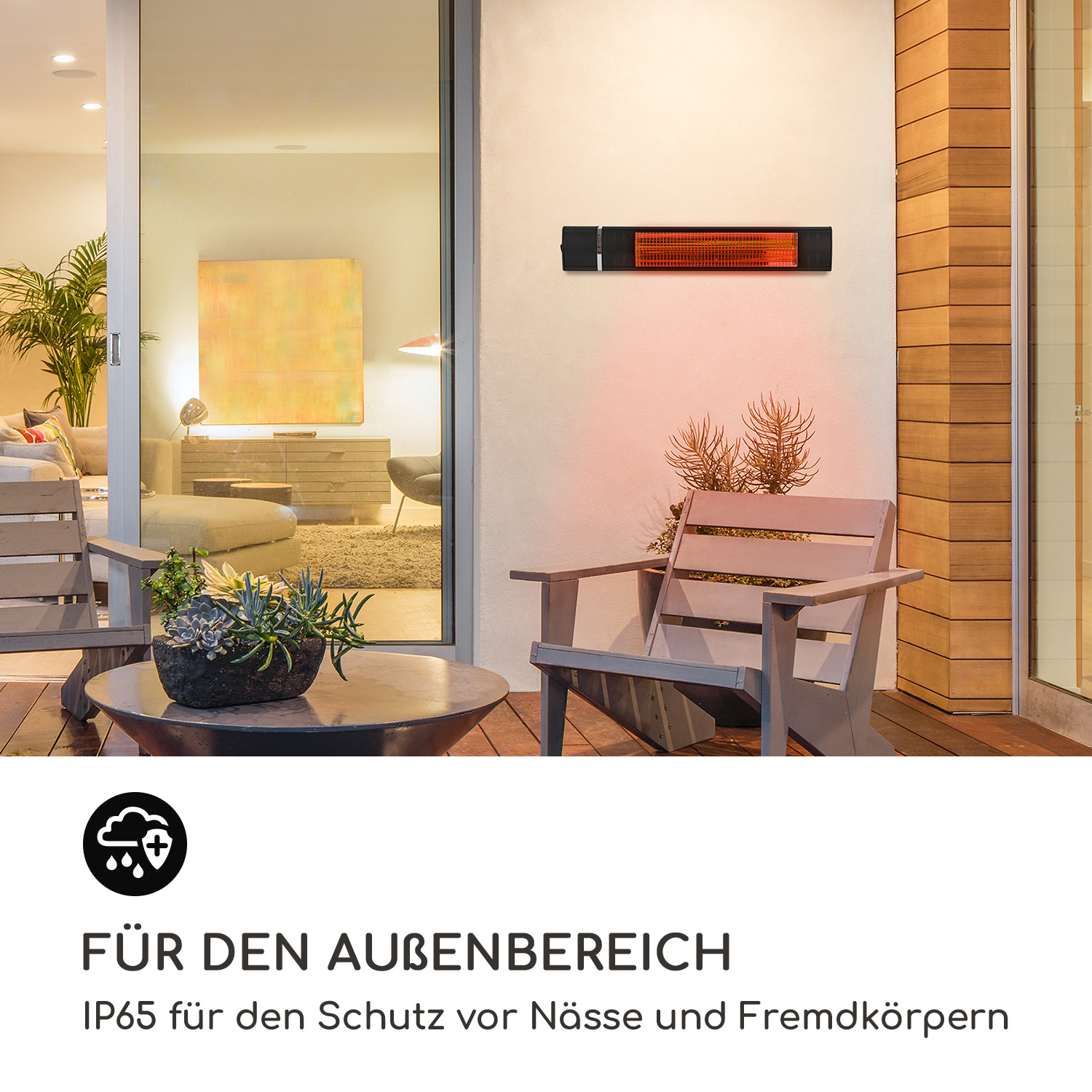 Ein an der Wand montierter Heizstrahler für den Außenbereich. Schwarzes Gerät mit rotem Heizelement.