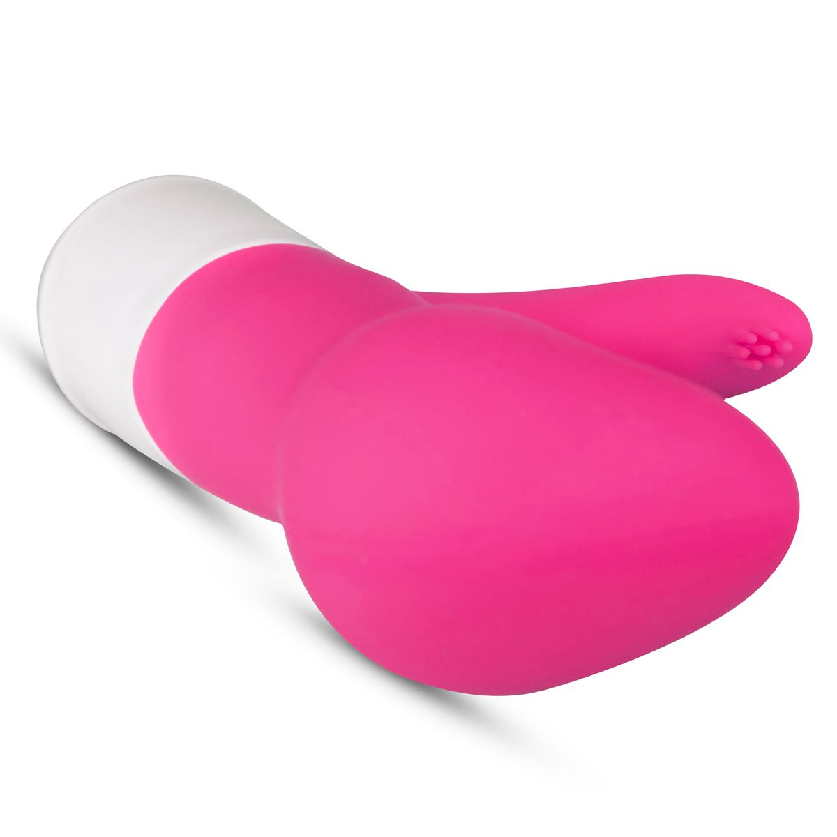 Pink-weißer Vibrator mit einzigartiger Form, liegt auf weißem Untergrund.