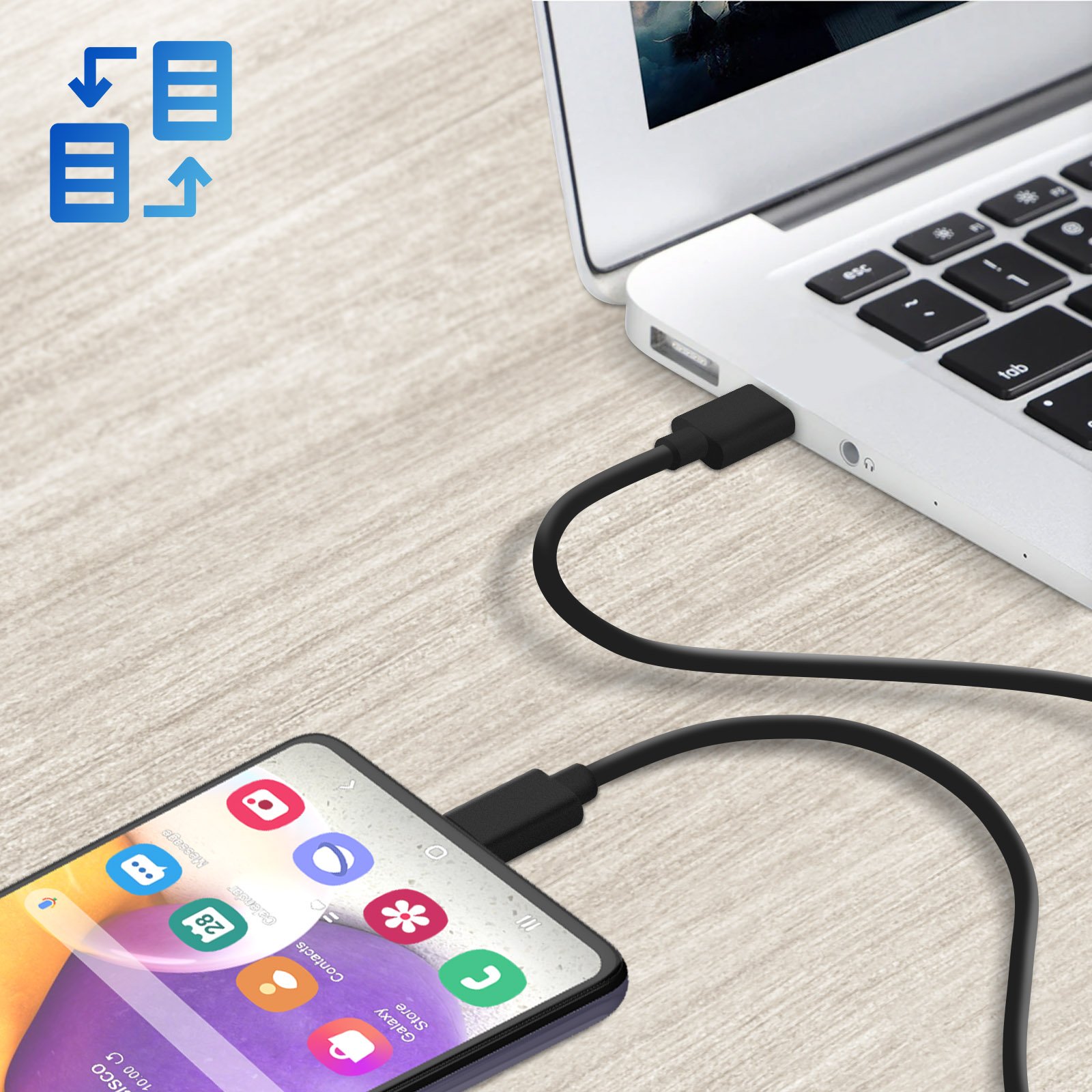 Telefono collegato a laptop tramite cavo USB. Icone di trasferimento.