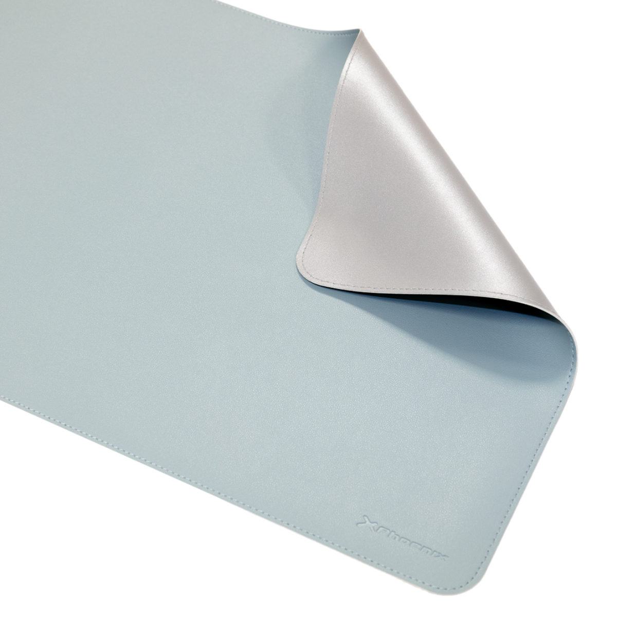 Una alfombrilla de ratón azul y gris. La capa superior es azul, la inferior gris.
