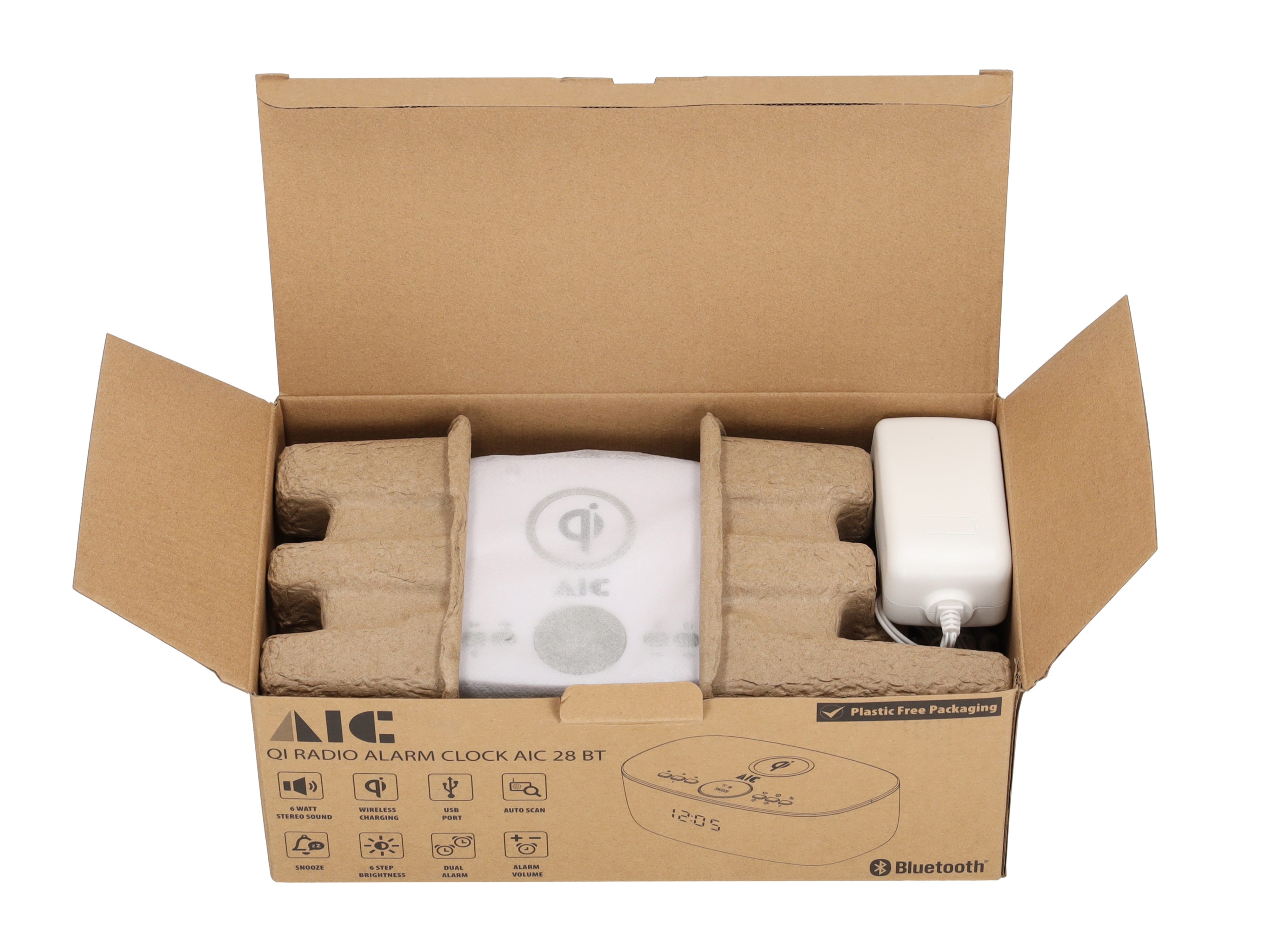 Wecker in geöffneter Box, mit Verpackung und kabellosen Ladefunktionen.