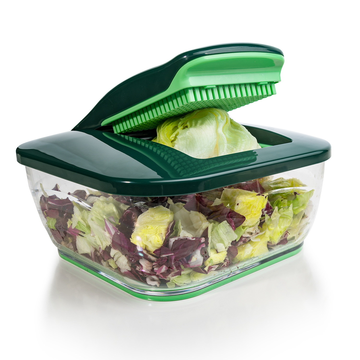 Grüner Salathacker mit Behälter mit gehacktem Salat.