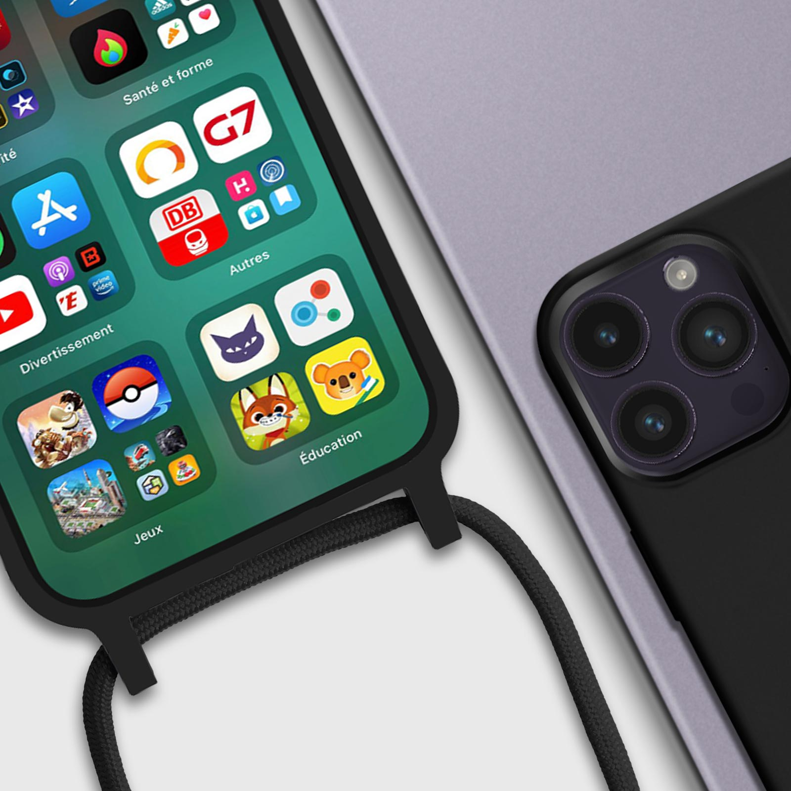 Gros plan sur un écran de smartphone avec icônes d'applications et étui noir.