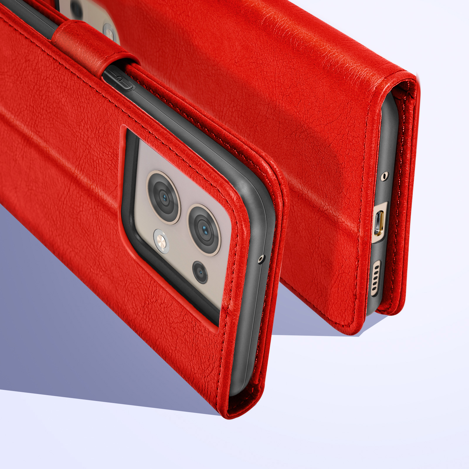 Rode telefoonhoes op een telefoon. De telefoon zit in een zak. De hoes is van rood leer.