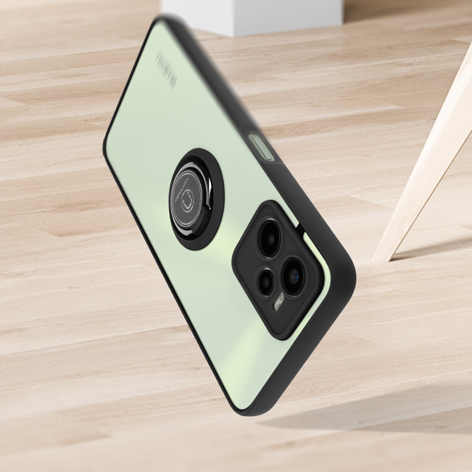 Una custodia per telefono con un obiettivo della fotocamera. È di colore verde chiaro e ha un bordo nero.