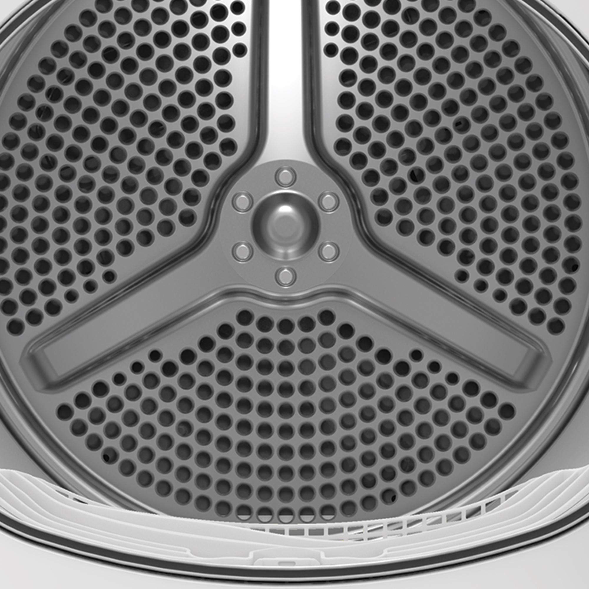 Innenseite eines Trockners, die eine perforierte Trommel aus Metall zeigt.