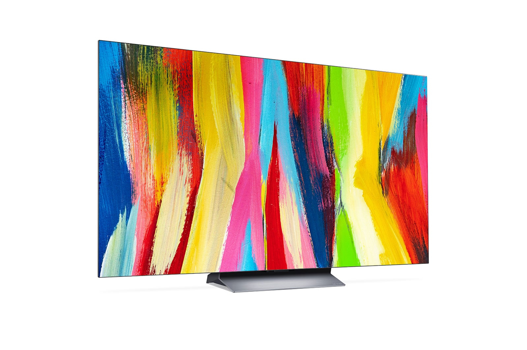 Televisor de pantalla plana moderno con arte abstracto colorido en la pantalla. El televisor tiene un soporte plateado.