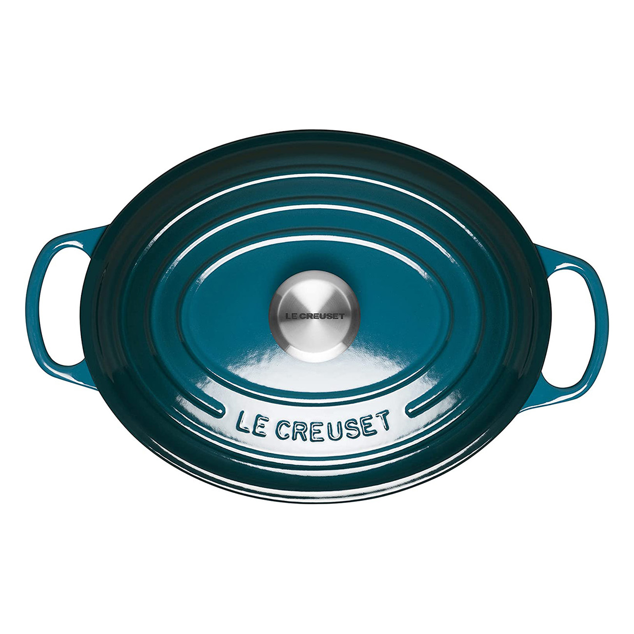 Türkisfarbener ovaler Le Creuset-Bräter mit silbernem Knopf, Draufsicht.